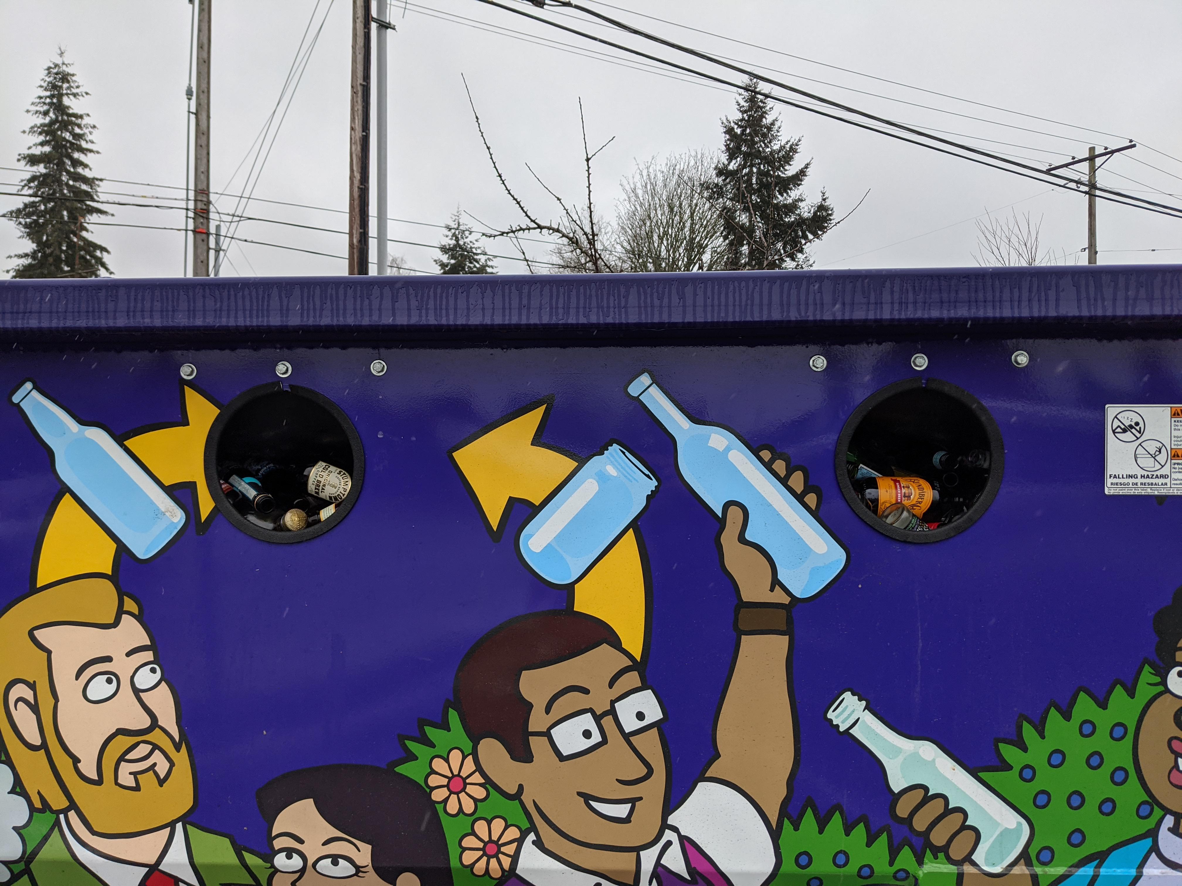 Glass recycle bins at Central Coop are full, almost overflowing just