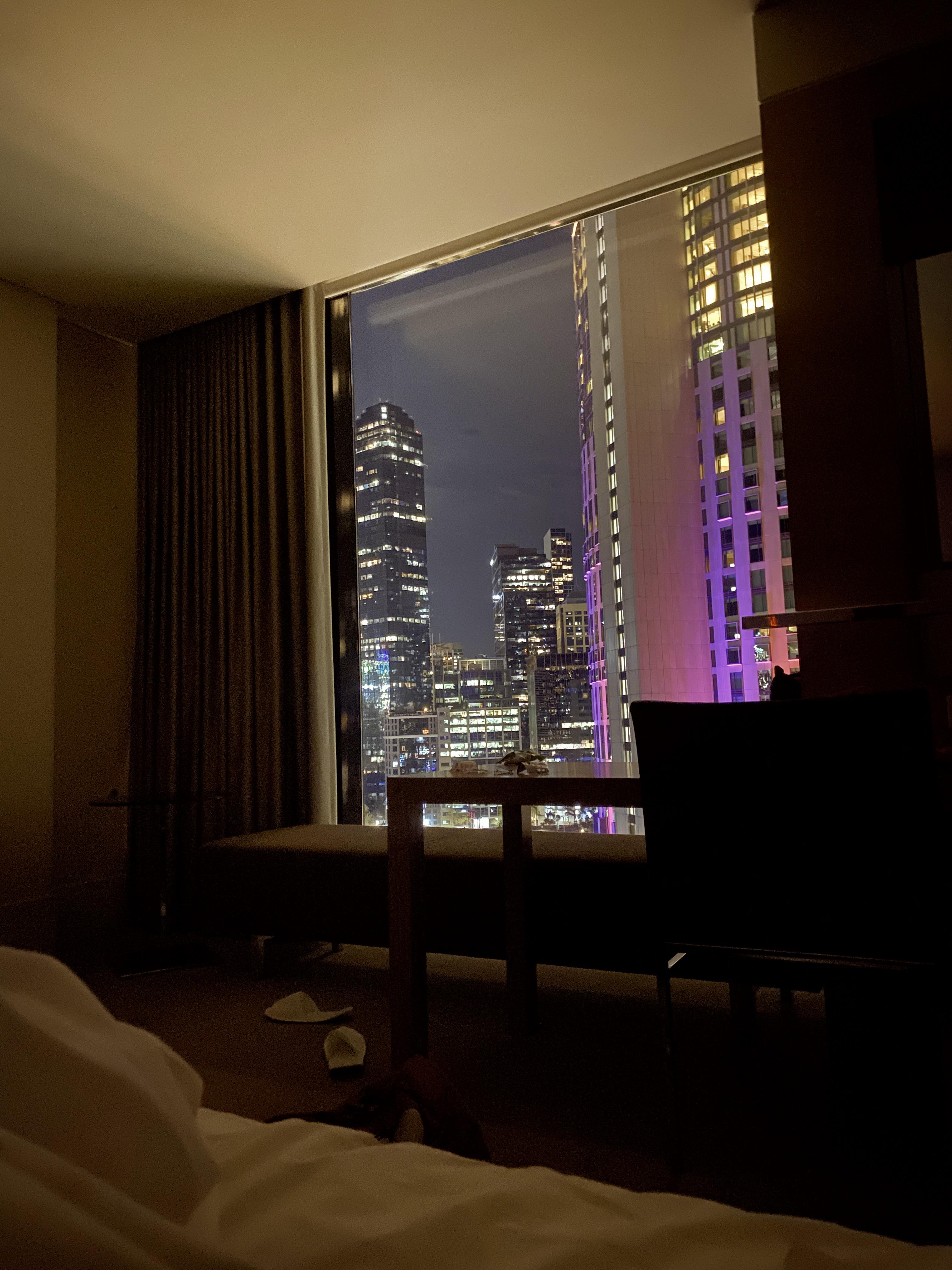 City views from my bed away from the rain r/CozyPlaces