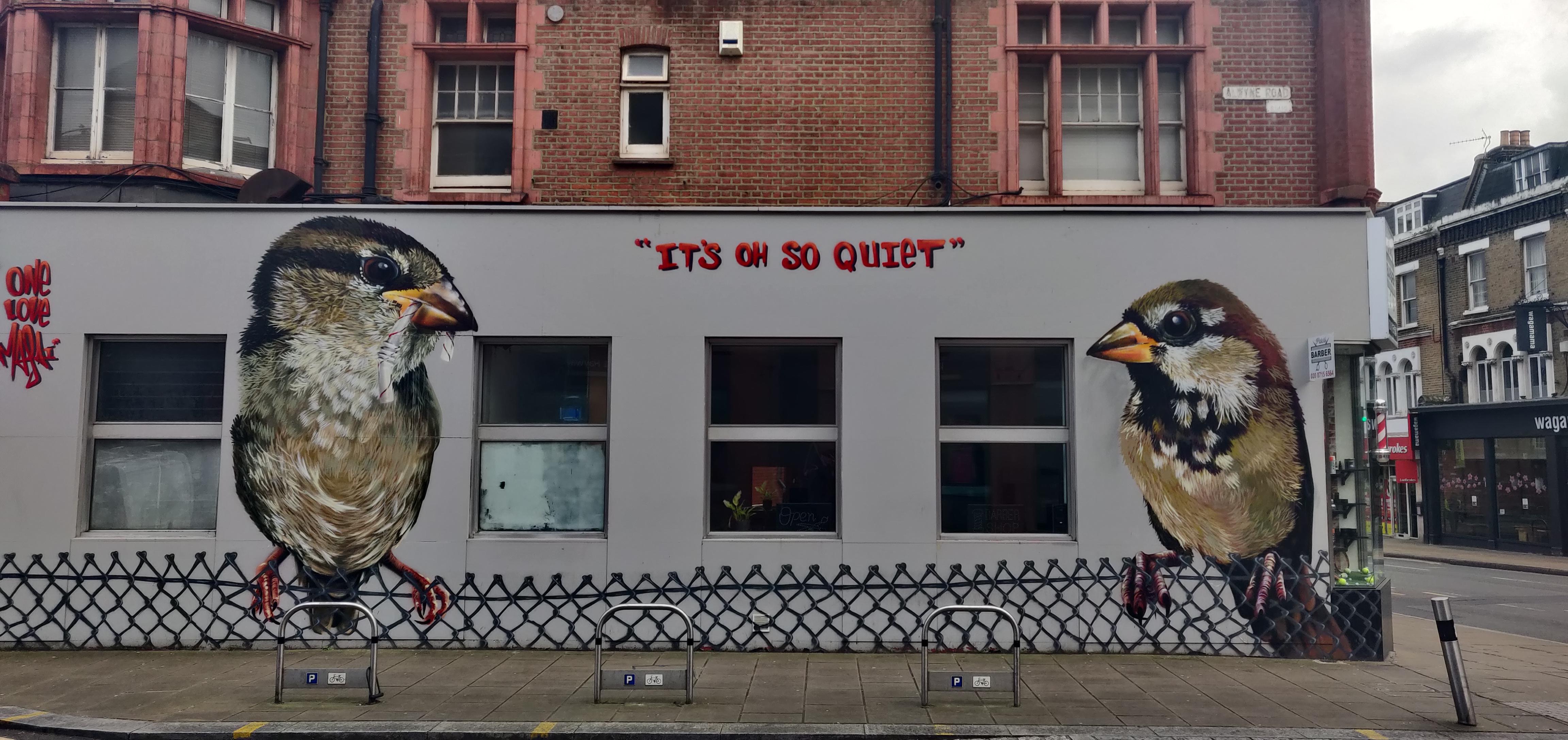 Just off Wimbledon Hill. On the side of a gents barbers. Anyone know