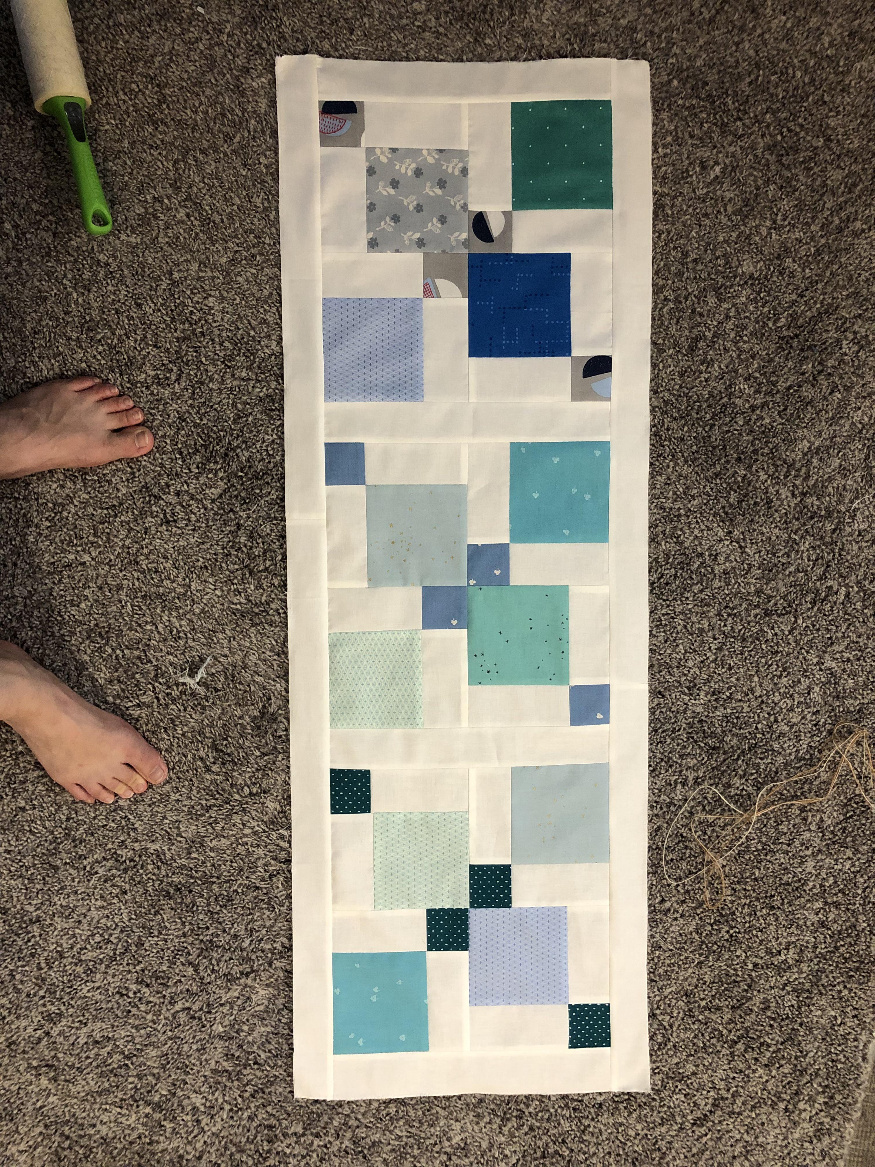 I made these disappearing 9patch test blocks, and then saw a blog where someone had turned them