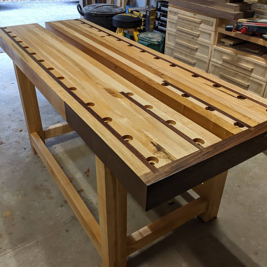 Hard maple and walnut workbench really starting to pop with some boiled
