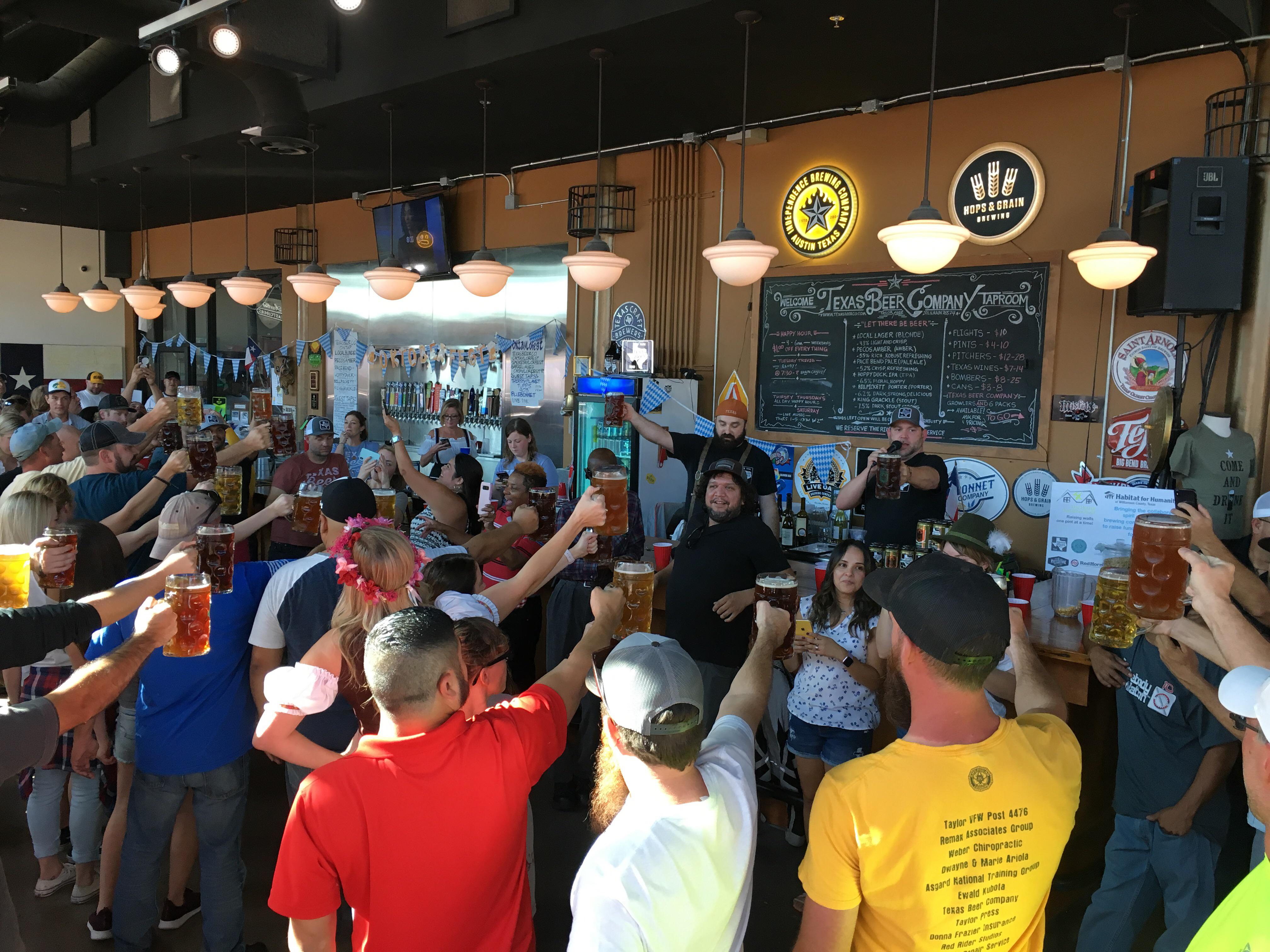 Stein hoist competition at Texas Brewing Co’s “Oktaylorfest.” r