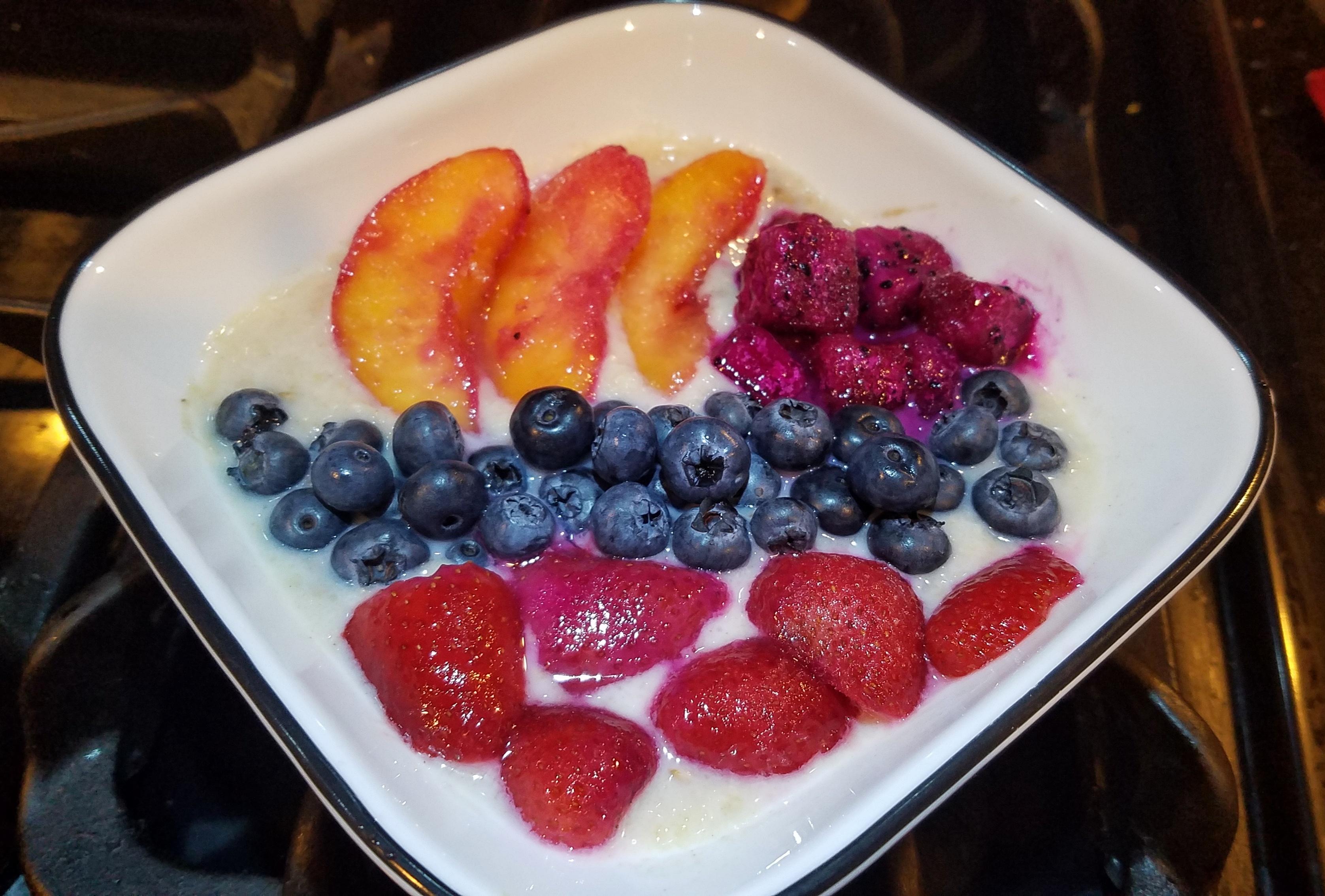 Preworkout breakfast multigrain raisin oatmeal, peach, dragonfruits