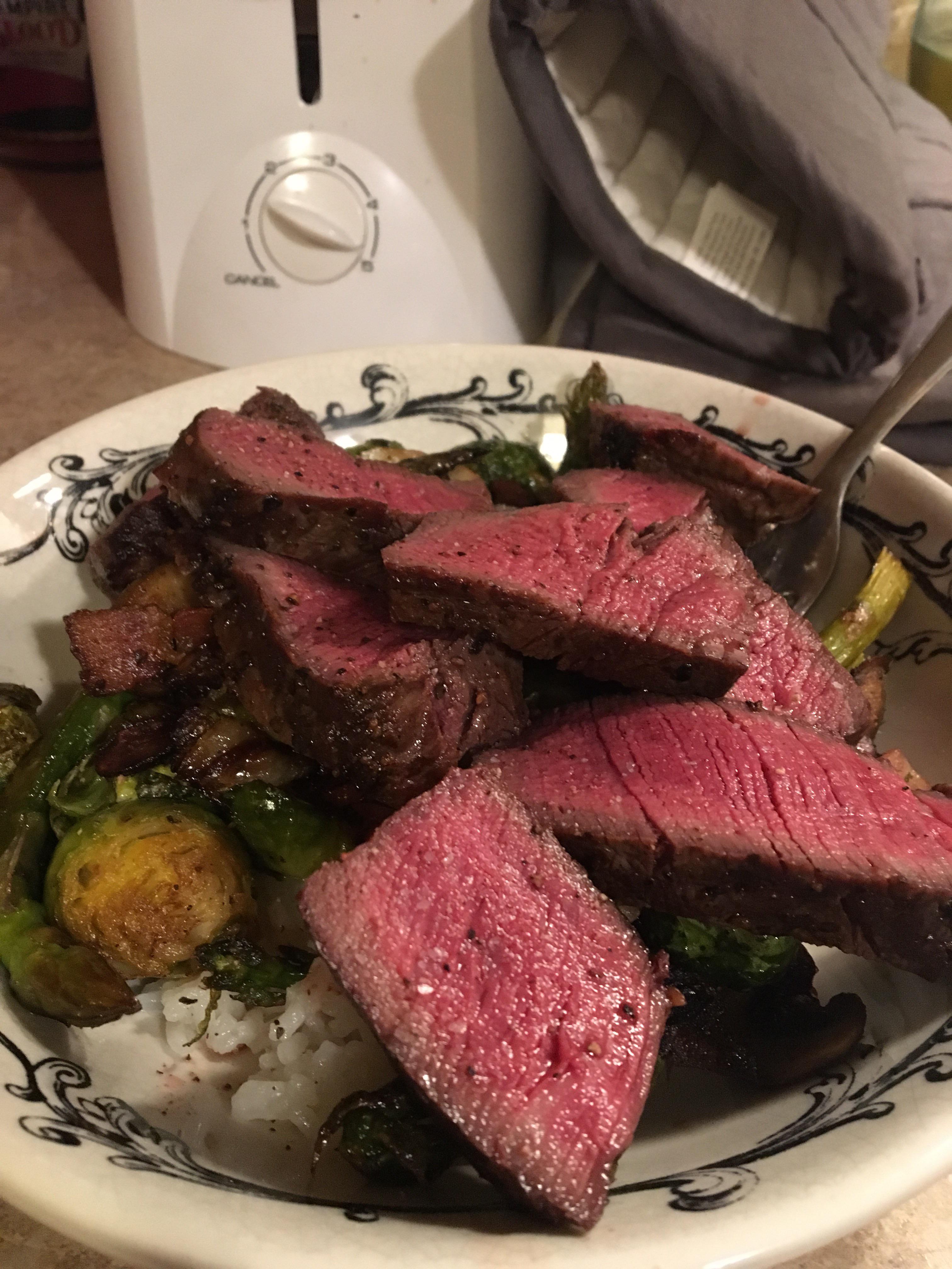 Sous Vide Strip Steak with roasted brussel sprouts. r/steak