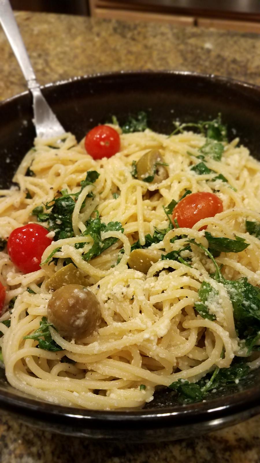 Simple homemade "pasta salad" spaghetti with lots of parmesan cheese
