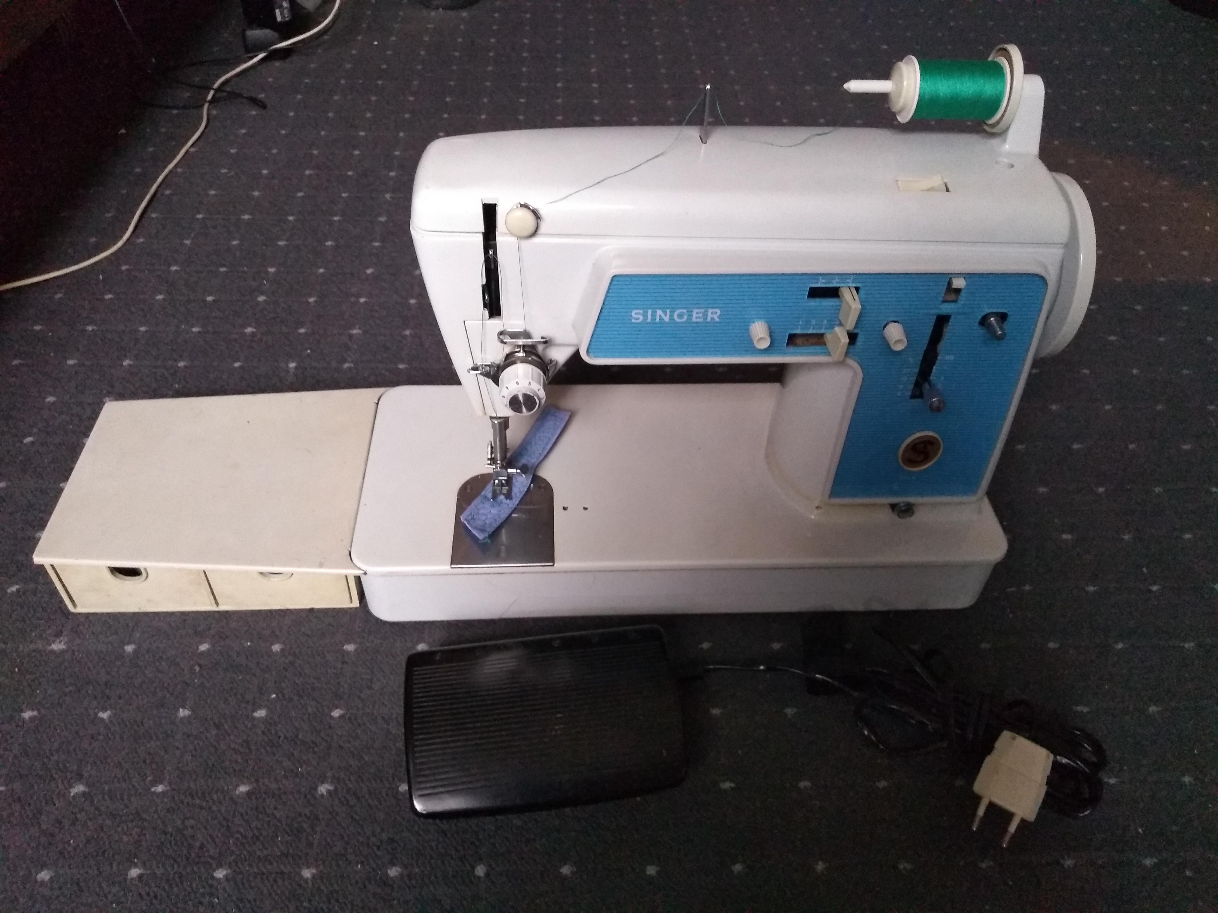 I got this second hand sewing machine for my birthday. A Singer 612G. I