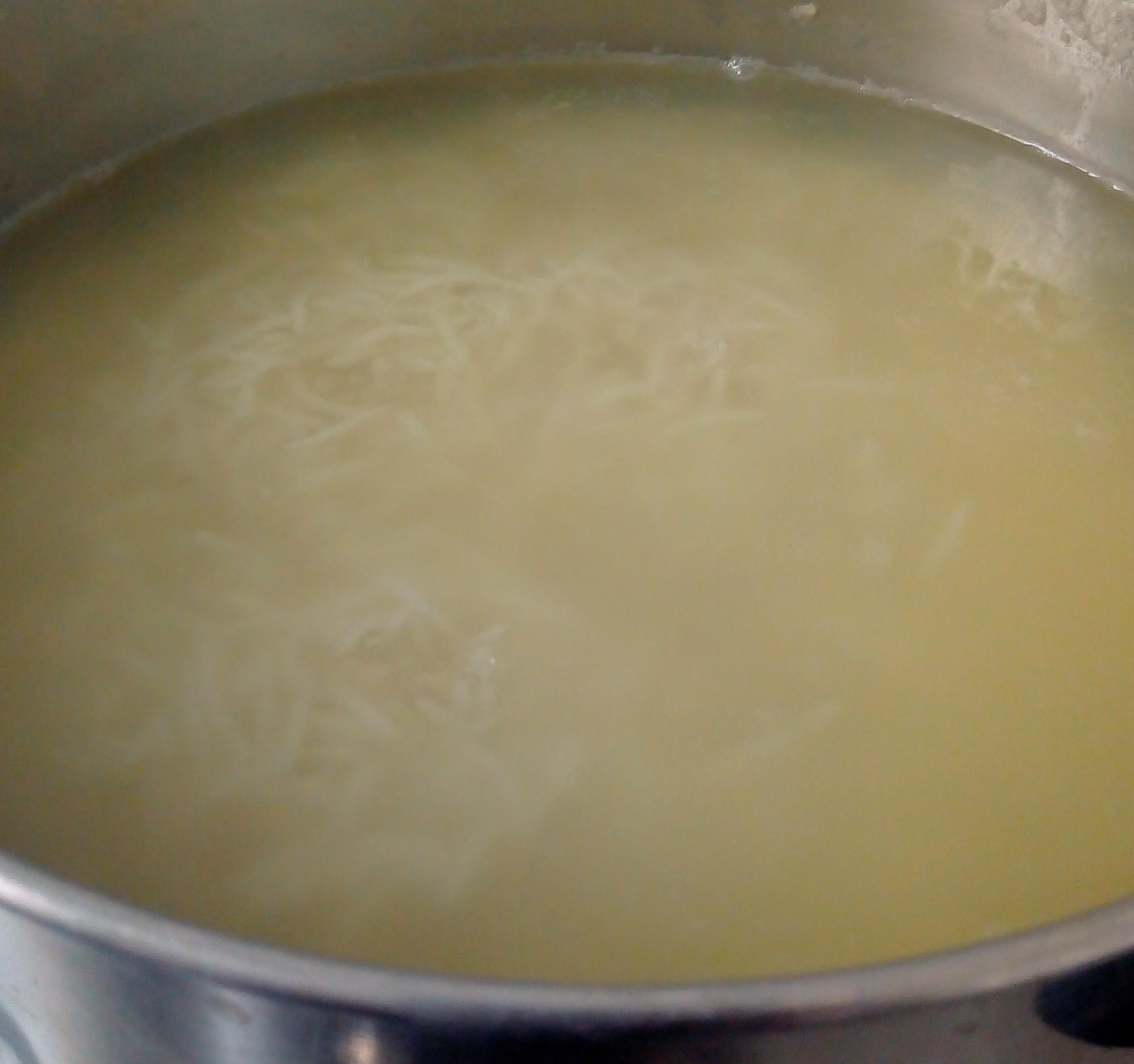 Why did the water turn yellowish while cooking rice ? What was released