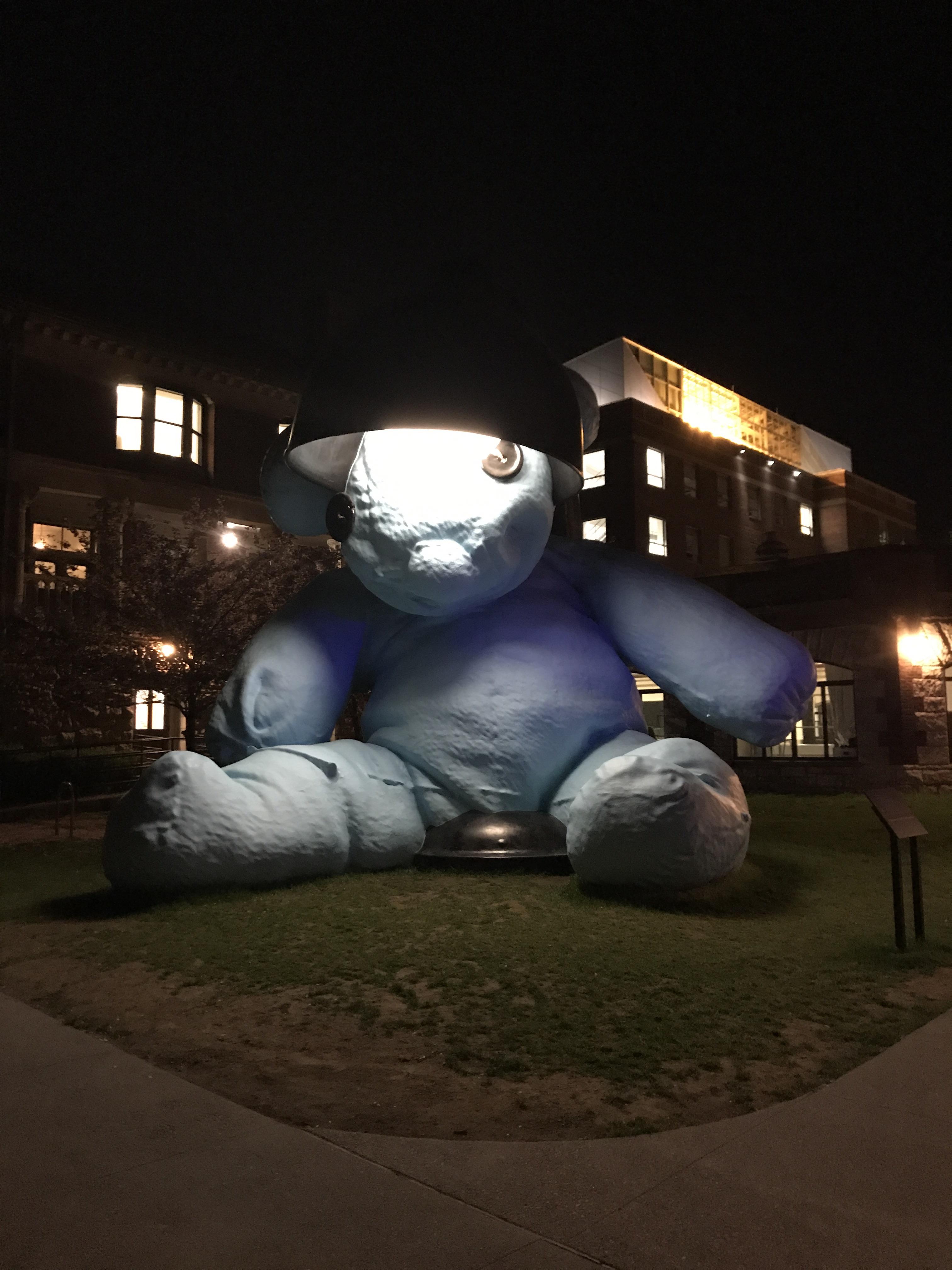 This is a giant blue bear with a lamp sculpture at Brown University
