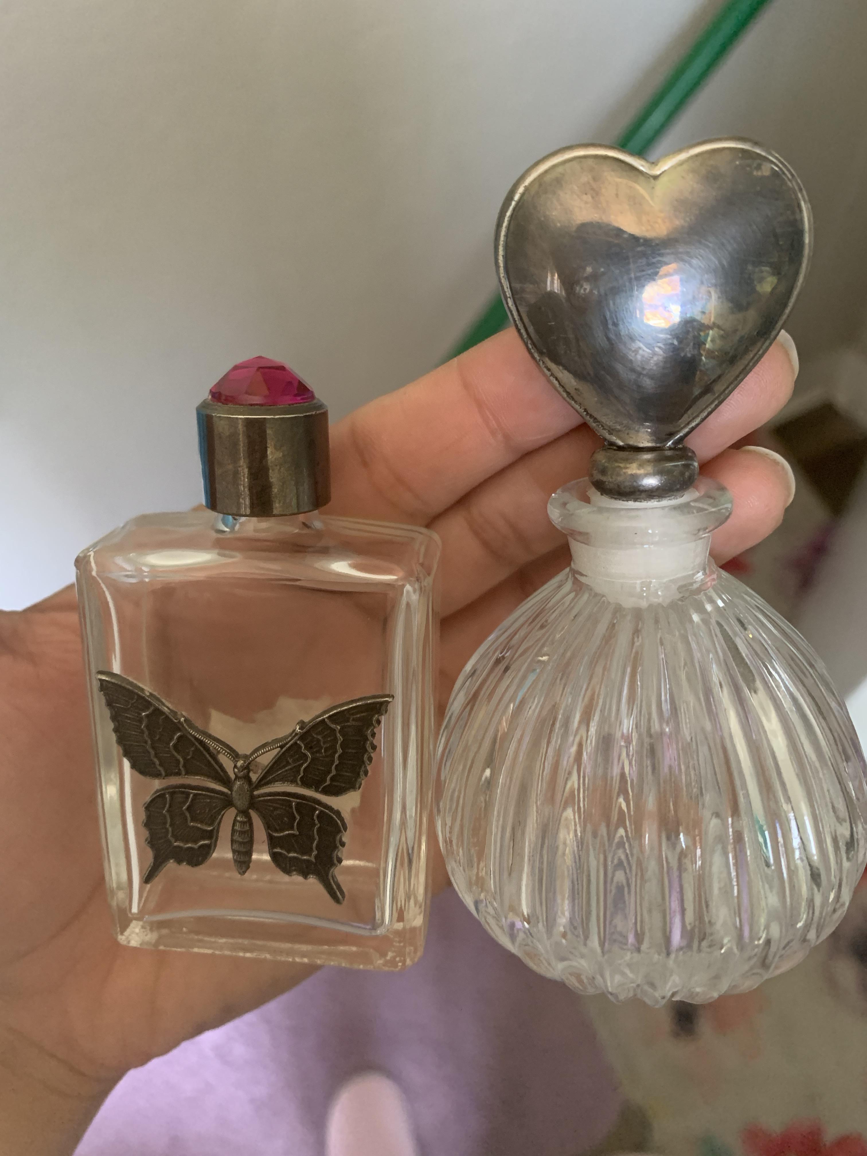 Got these cute perfume atomizers at an estate sale. What can I use on the heart top to make it