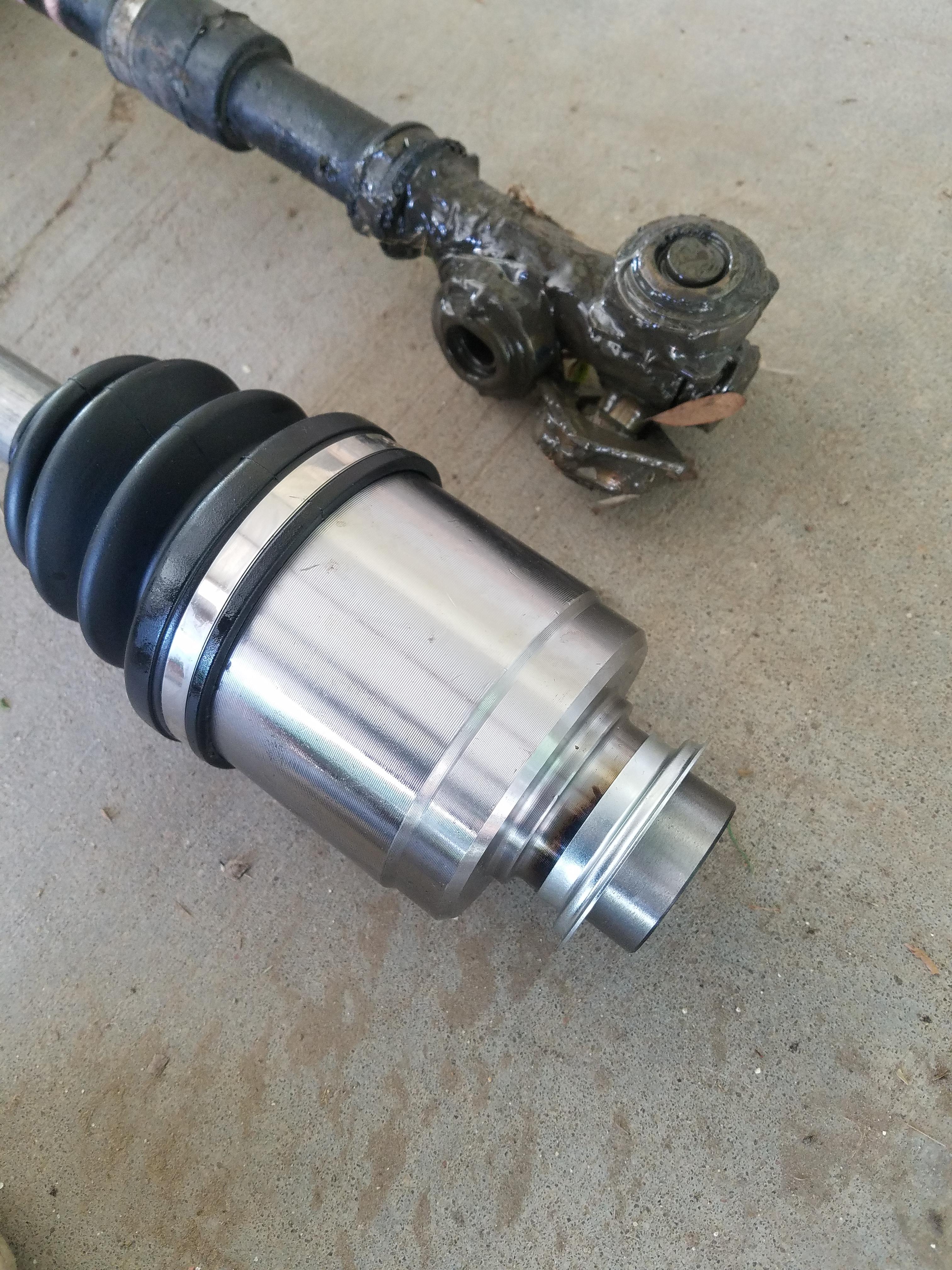 Installing new Cv axle, I can't get the end of the old axle separated