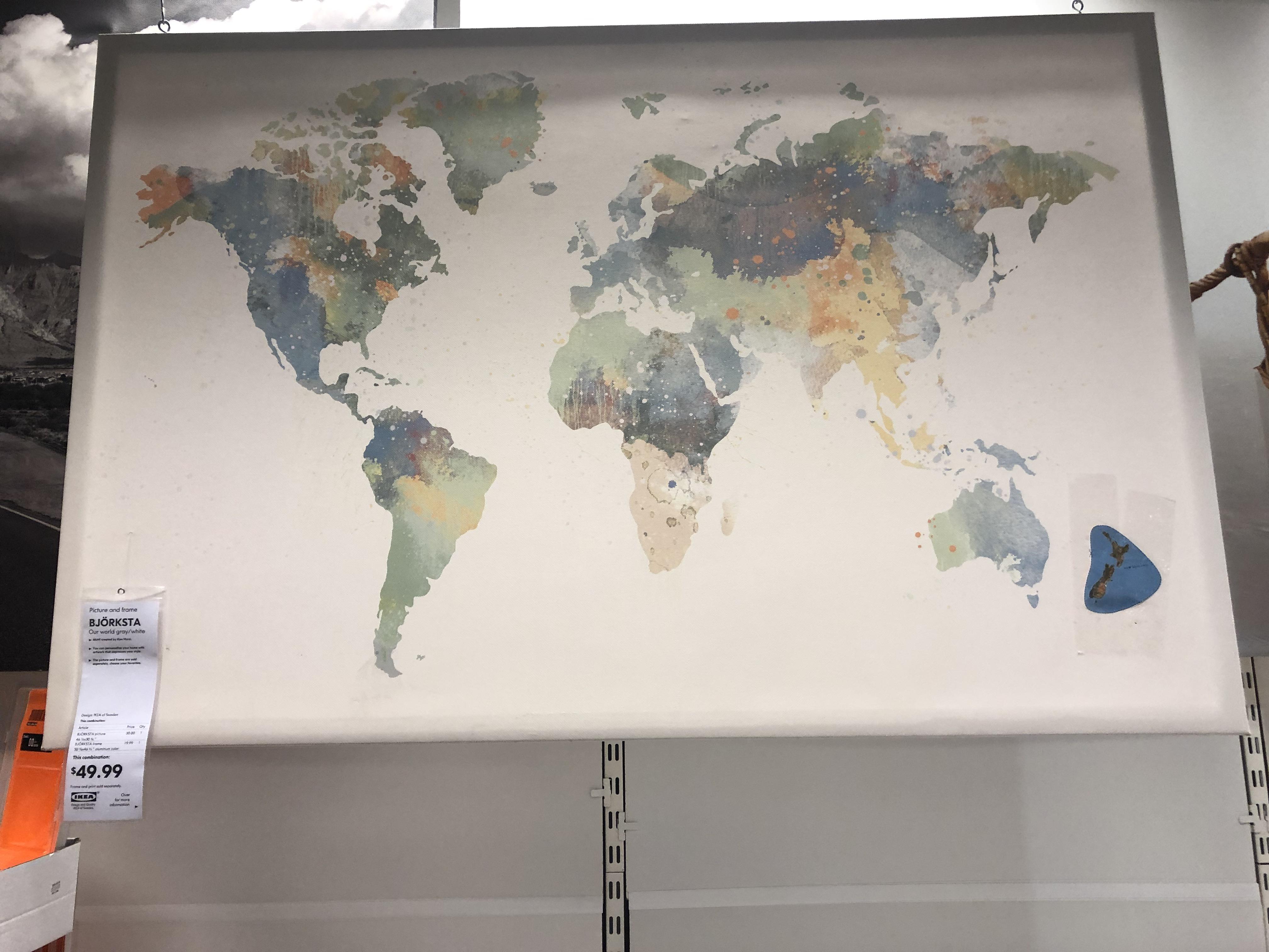 This map on display at IKEA where someone added New Zealand with tape. mildlyinteresting