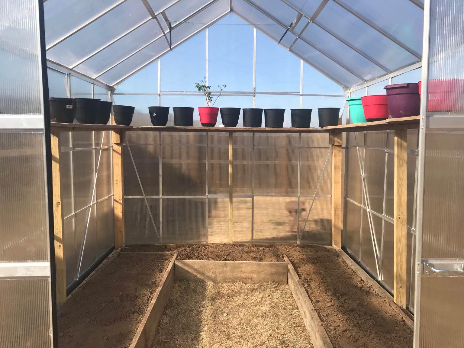 Finally got my Greenhouse set up! Around 3000lbs of dirt! r/gardening