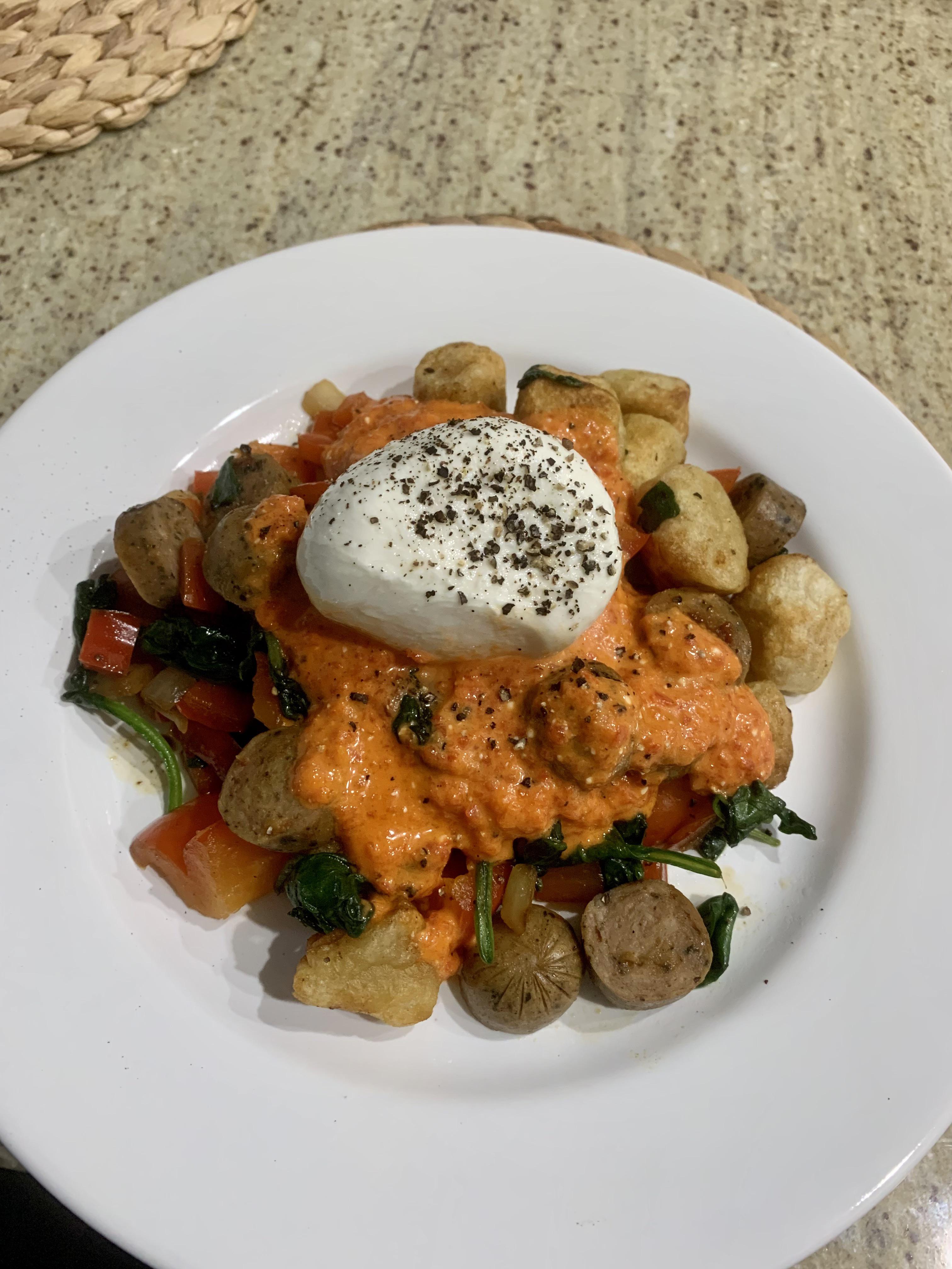 air fried cauliflower gnocchi with chicken sausage, roasted red pepper