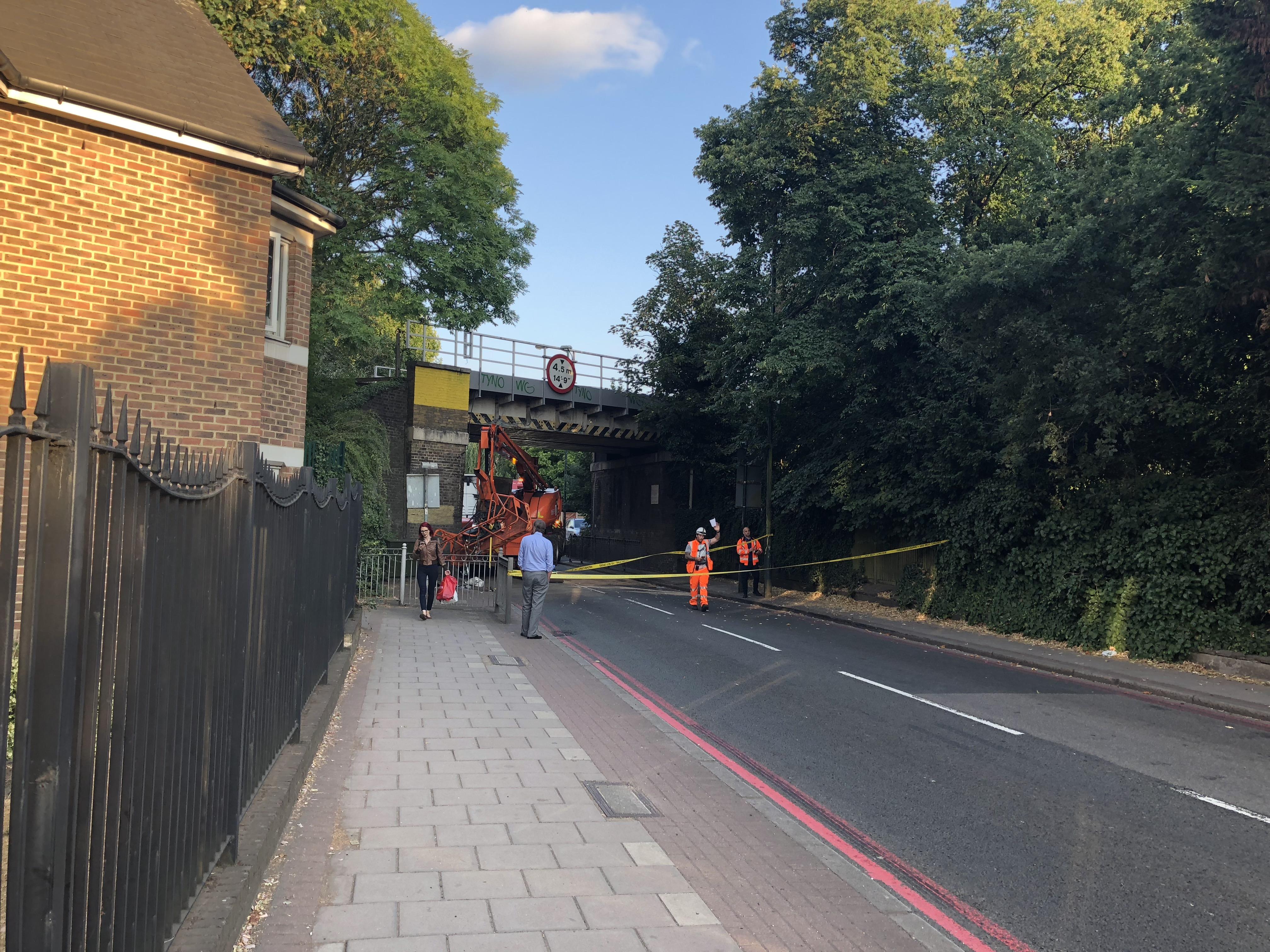 Overheight vehicle that hit the train bridge over Mortlake road