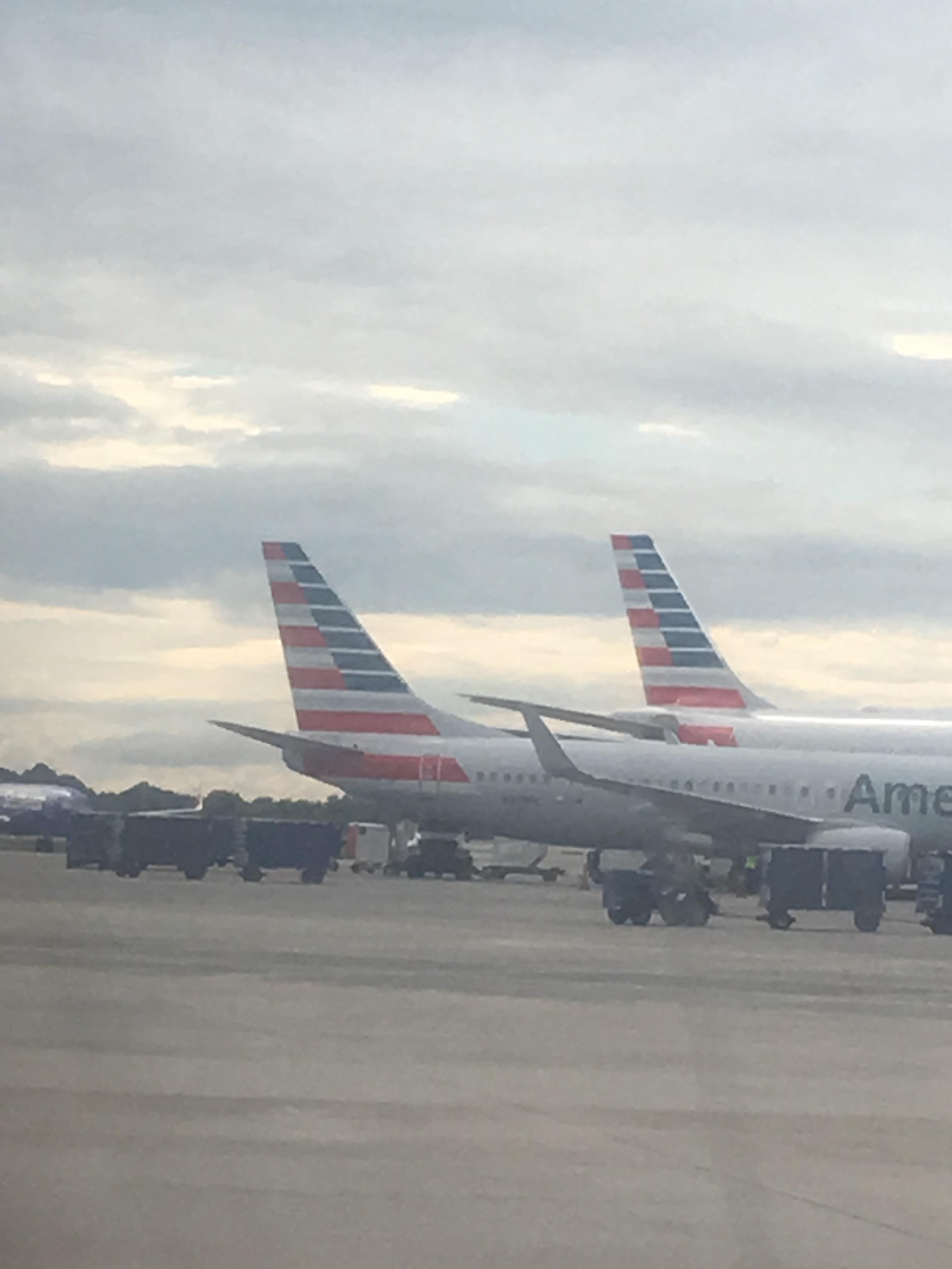 The flags on the tails of American Airlines planes are painted