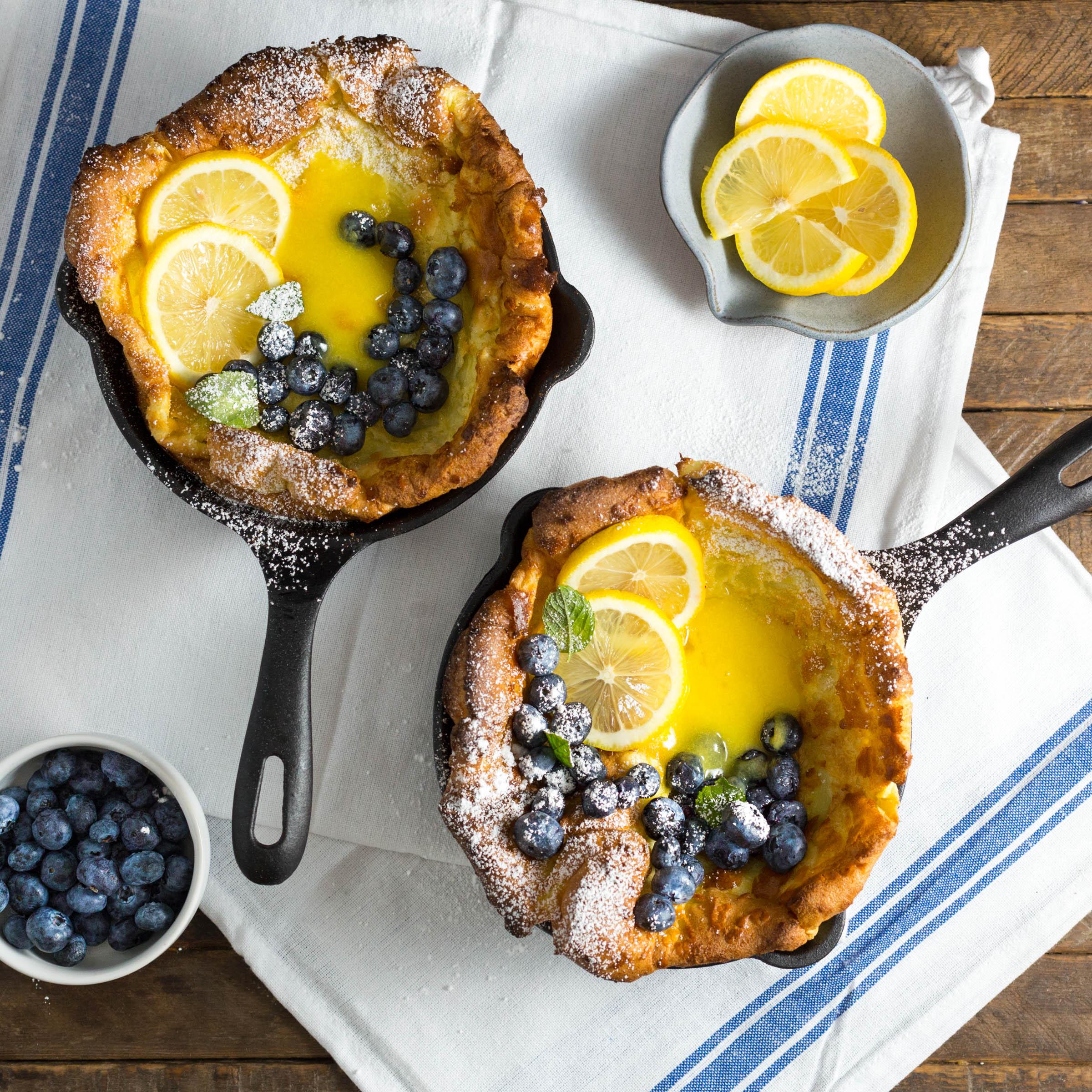 Mini Dutch Babies with Lemon Curd and Blueberries cooked in Victoria
