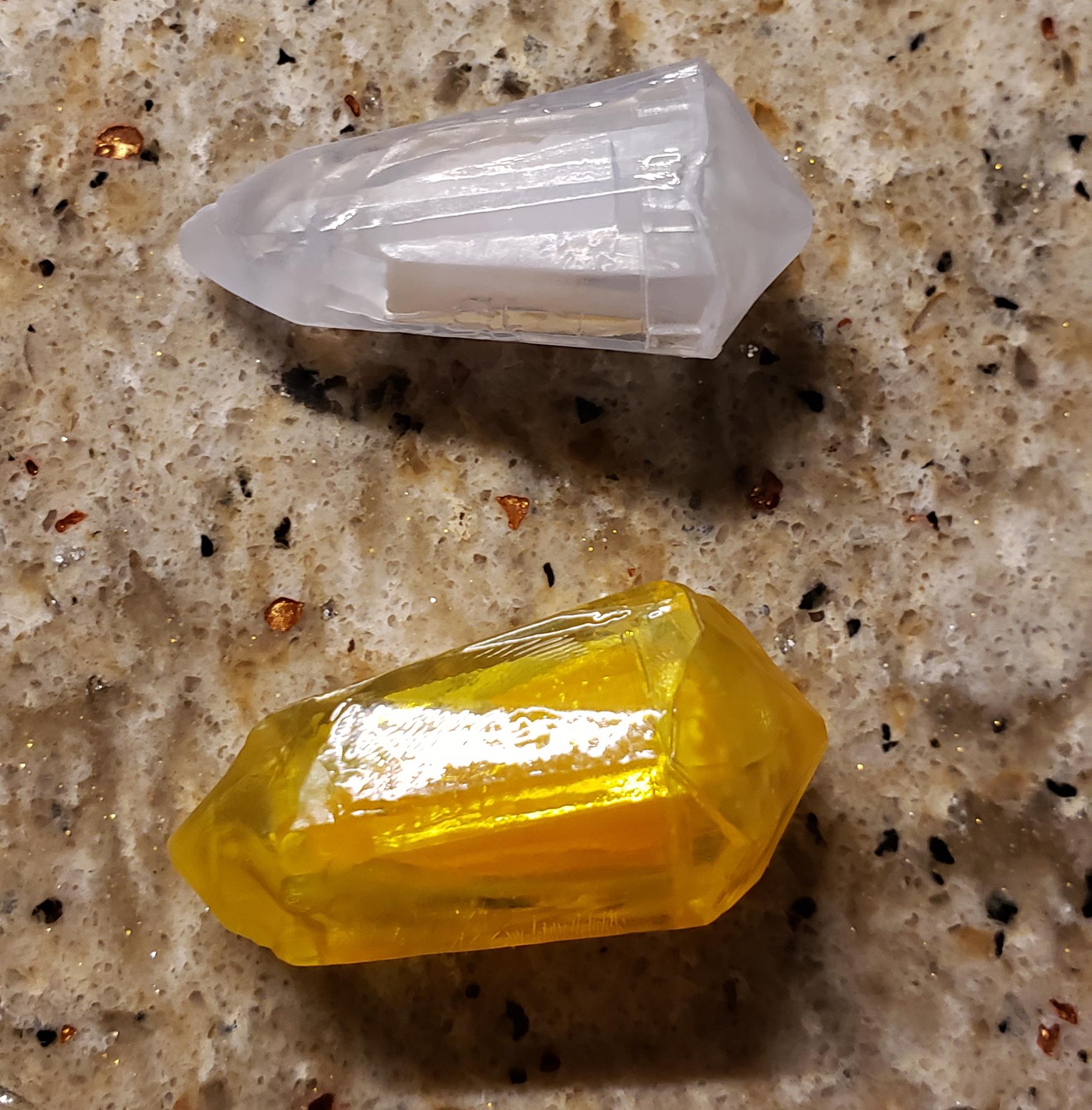 Got these two kyber crystals today, getting a purple one