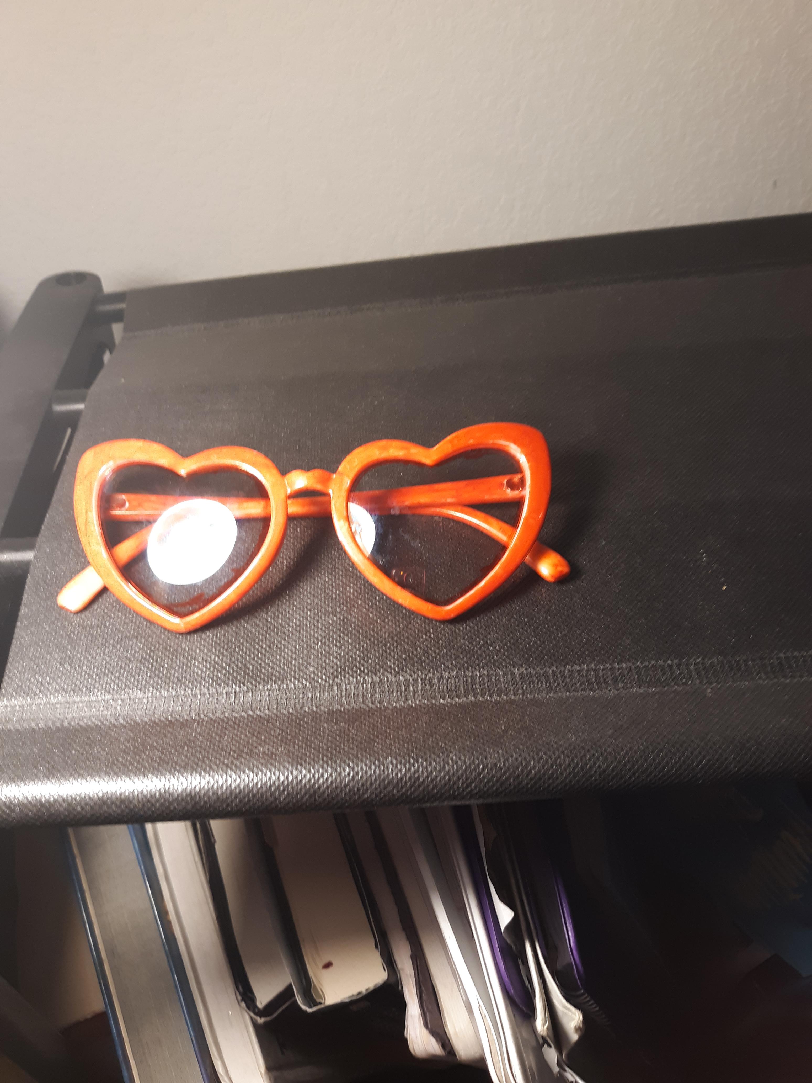 I painted my white heart glasses red so now my glasses look like noodle