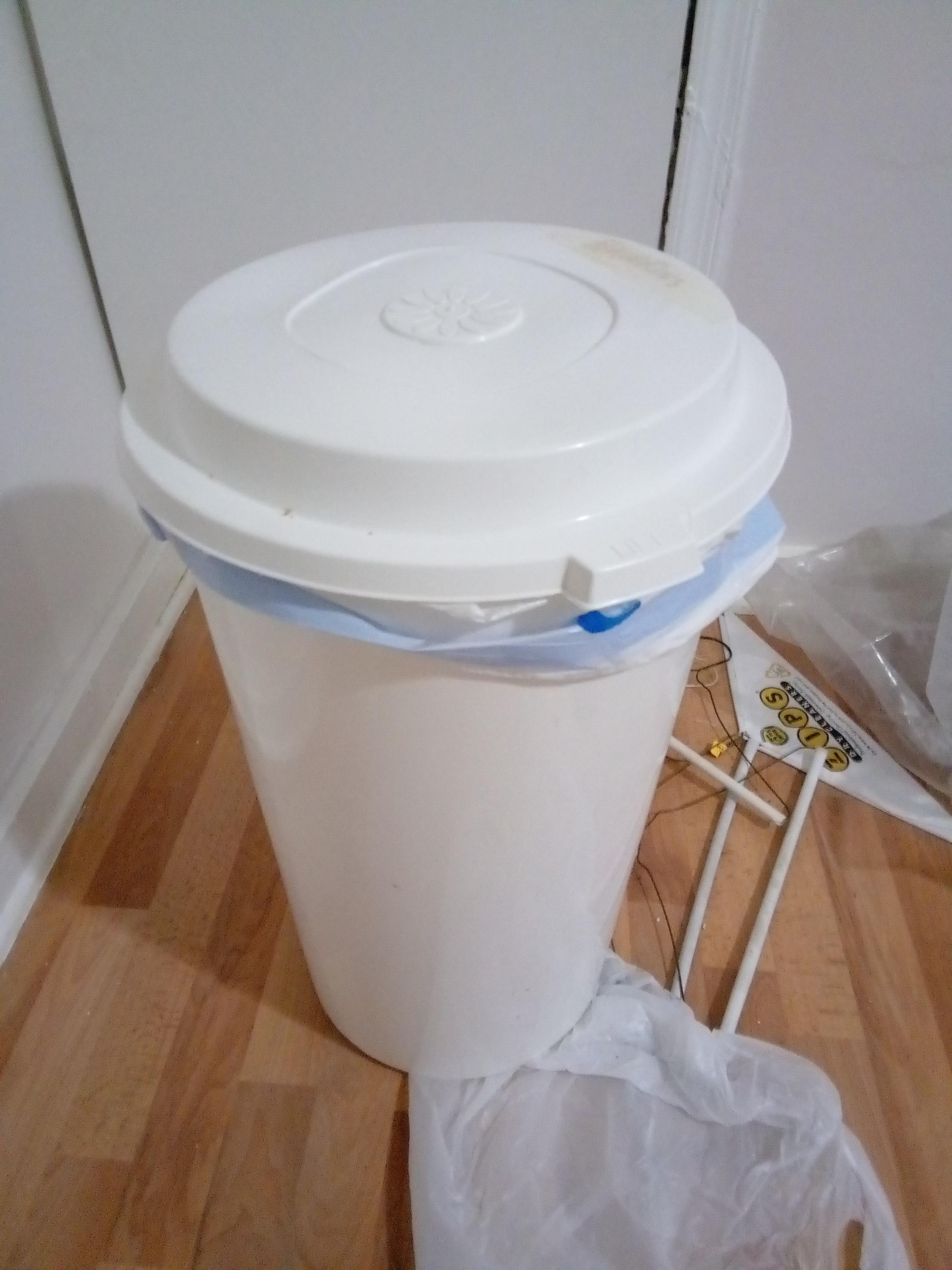 This is my diaper pail! It's where my mommy puts my wet and stinky
