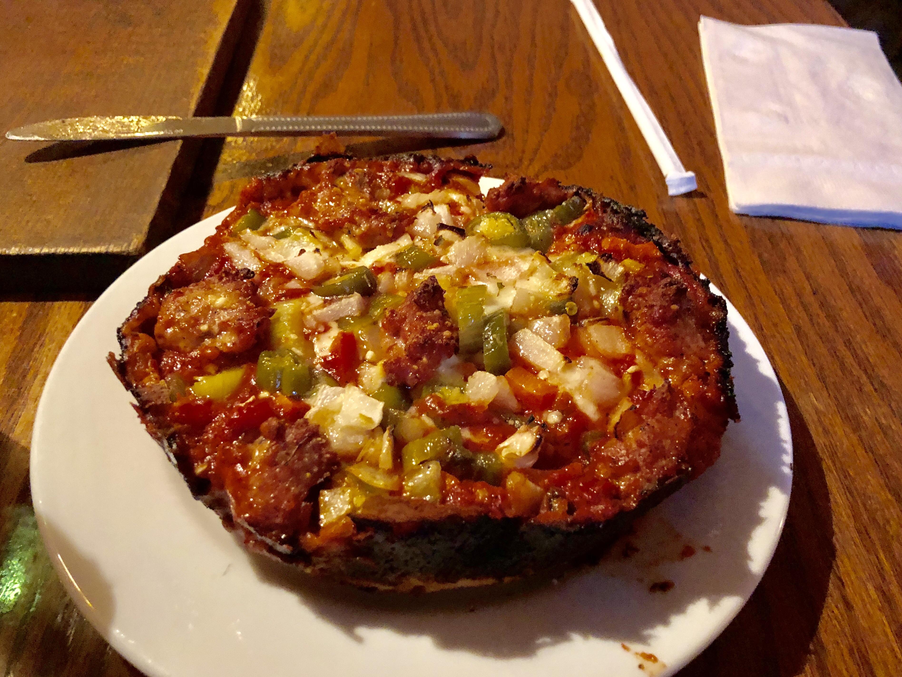 Sausage, giardinara and onion deep dish pie from Pequod’s in Chicago