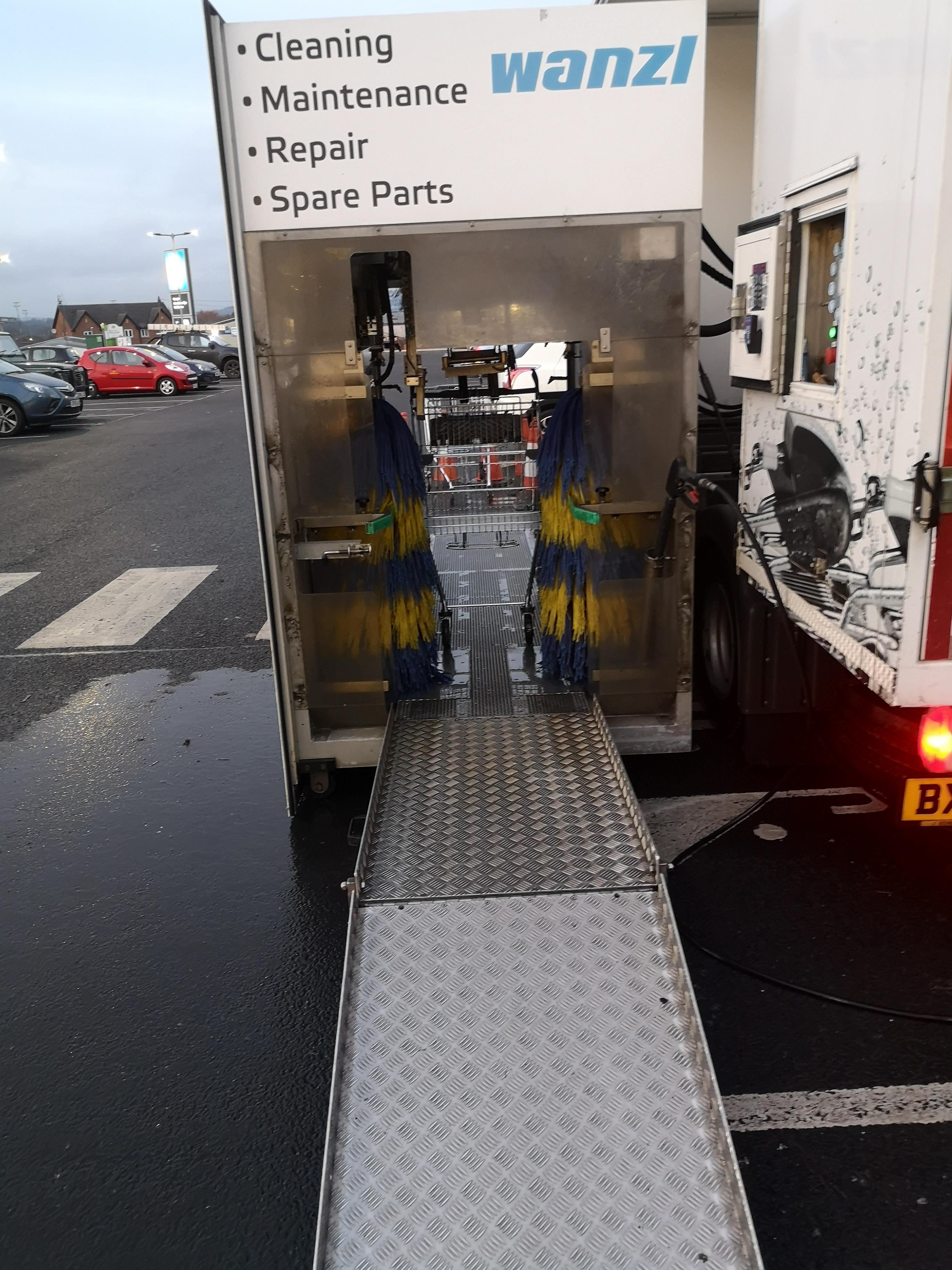 Trolley wash. Like a car wash, just tiny. r/mildlyinteresting