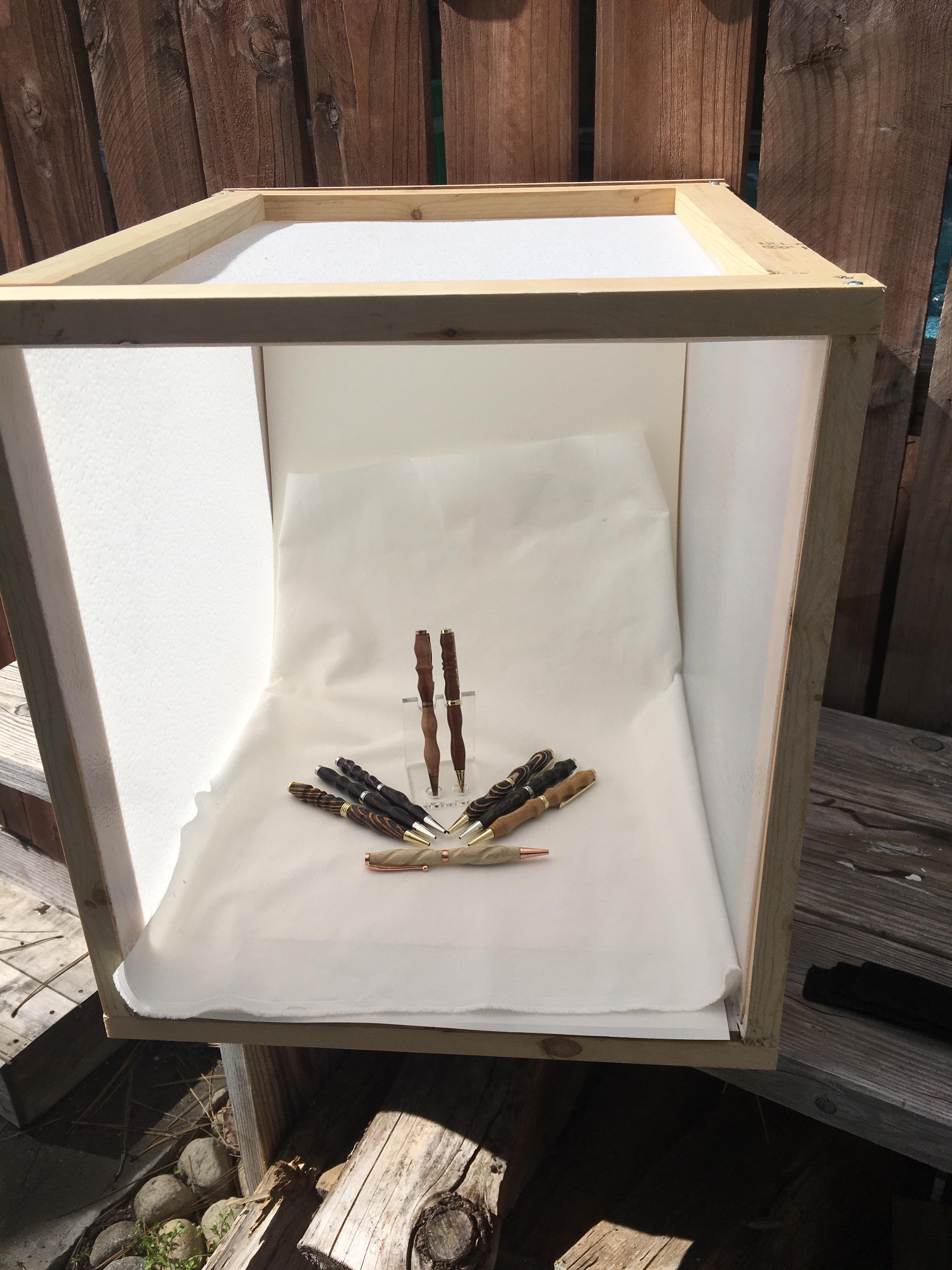 I made a light box to take pictures of my pens I still need lights and