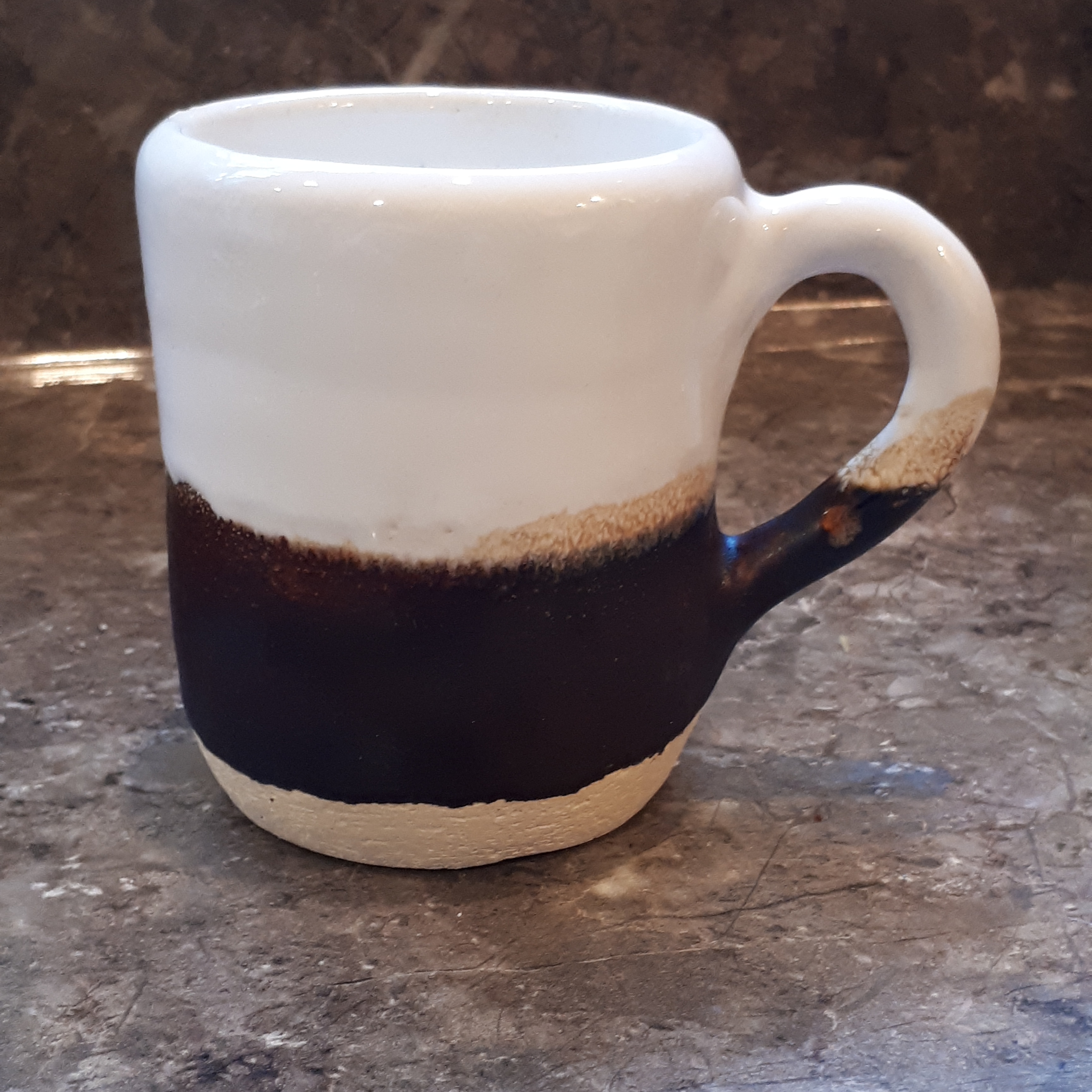 A mug from my recent firing, love how the glaze overlap like a