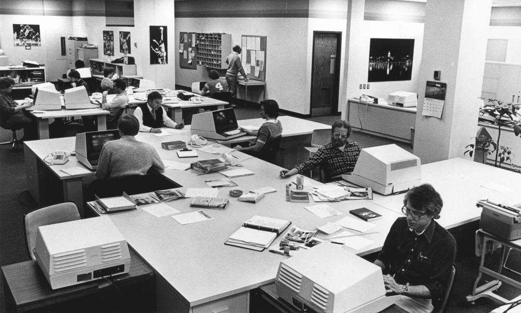 Copy desk in the Wisconsin State Journal newsroom in 1981. Typewriters