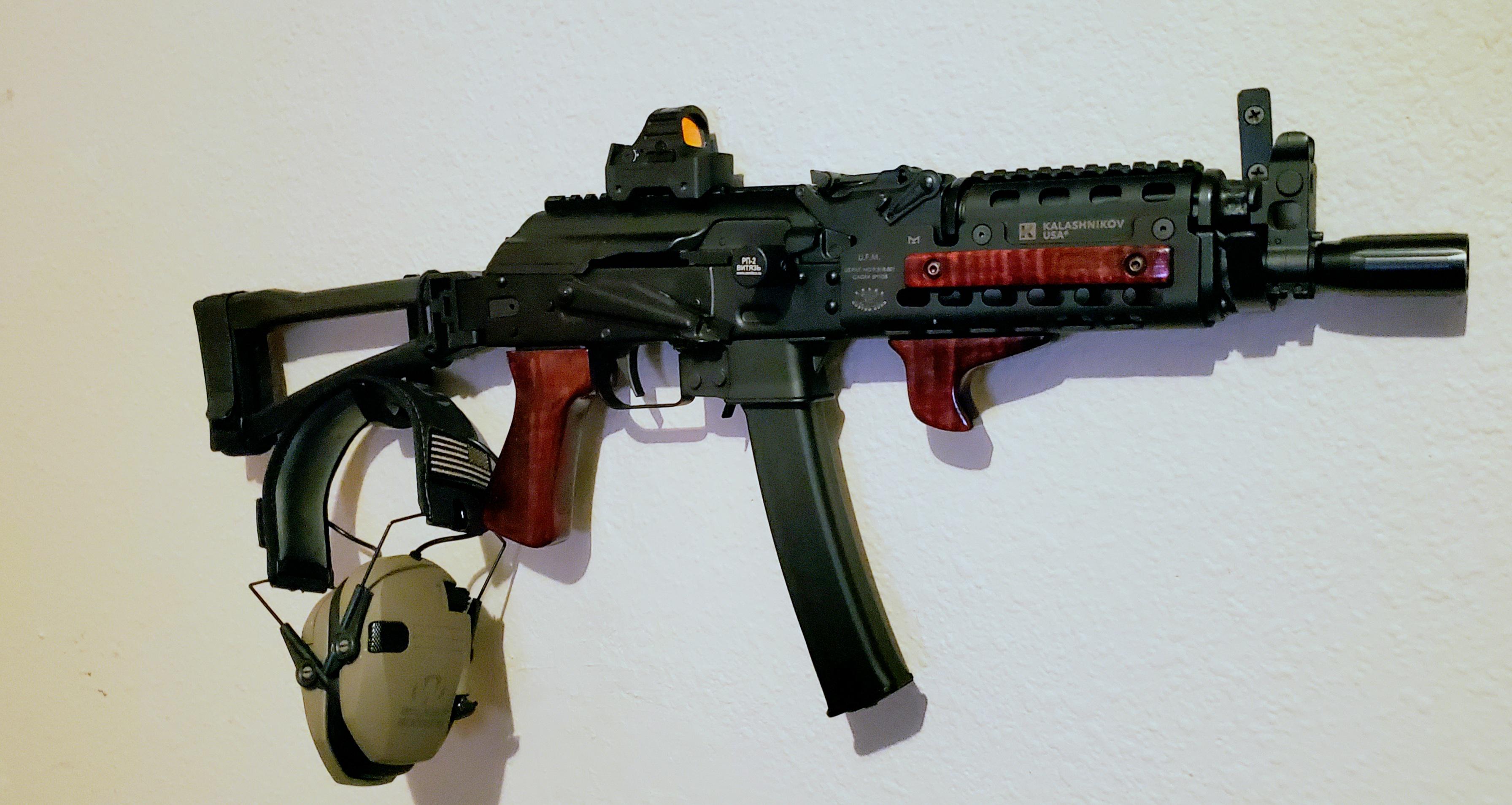 Here is my kp9 with some nice red curly maple wood work done by Levtech