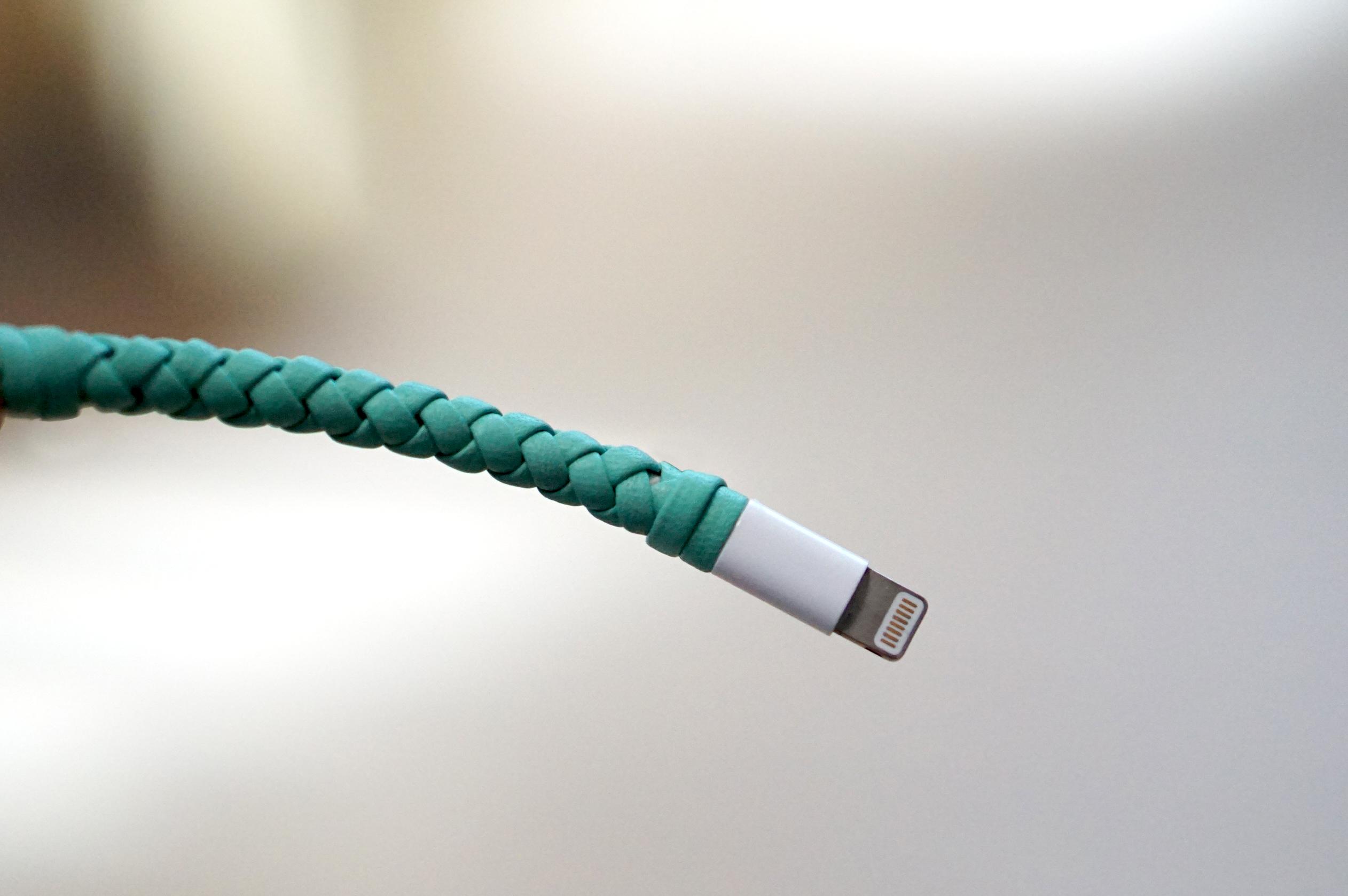 I used leather to fix the frayed iPhone's lightning cable r/lifehacks