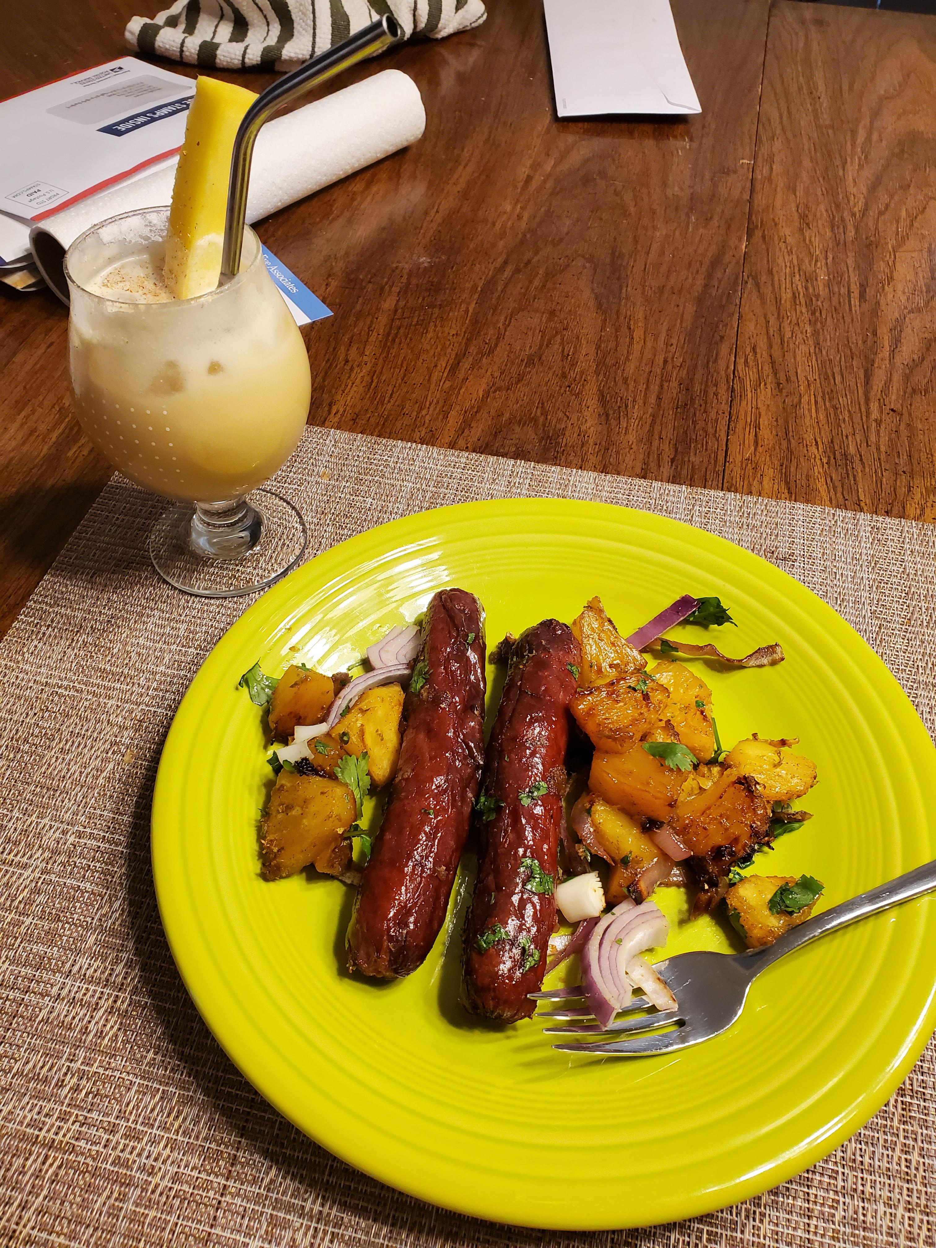 Enjoying my tiki Thursday with a painkiller and sausages with tangy, gingery pineapple. r/Tiki