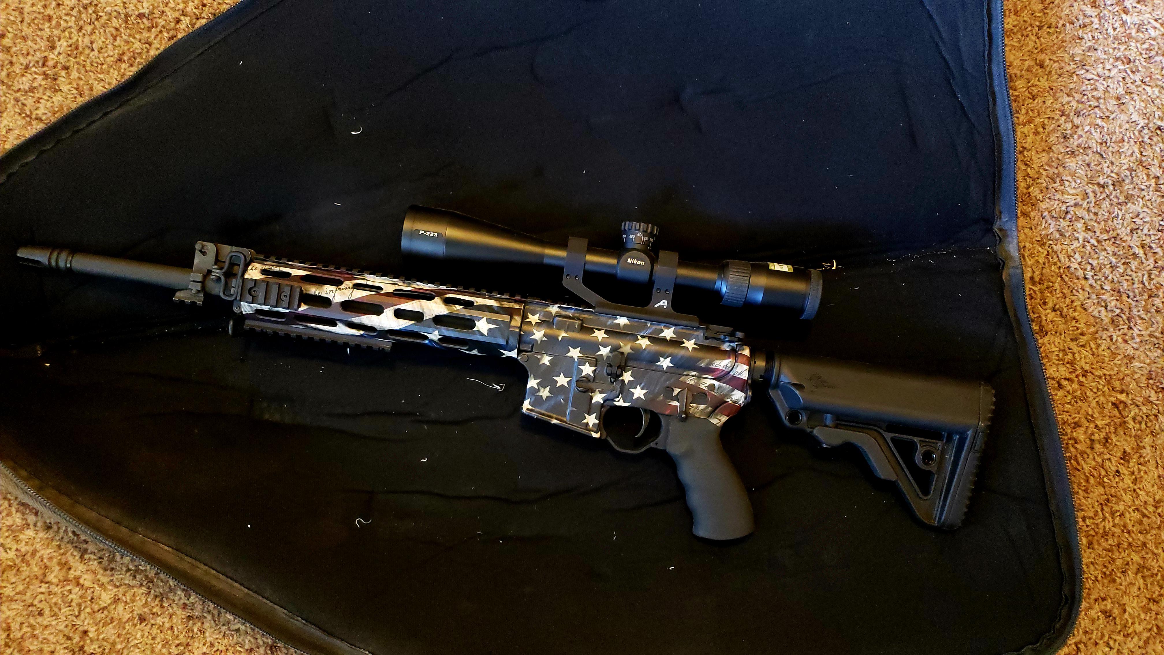 Rock River Elite Operator 2 with vinyl skin. r/guns