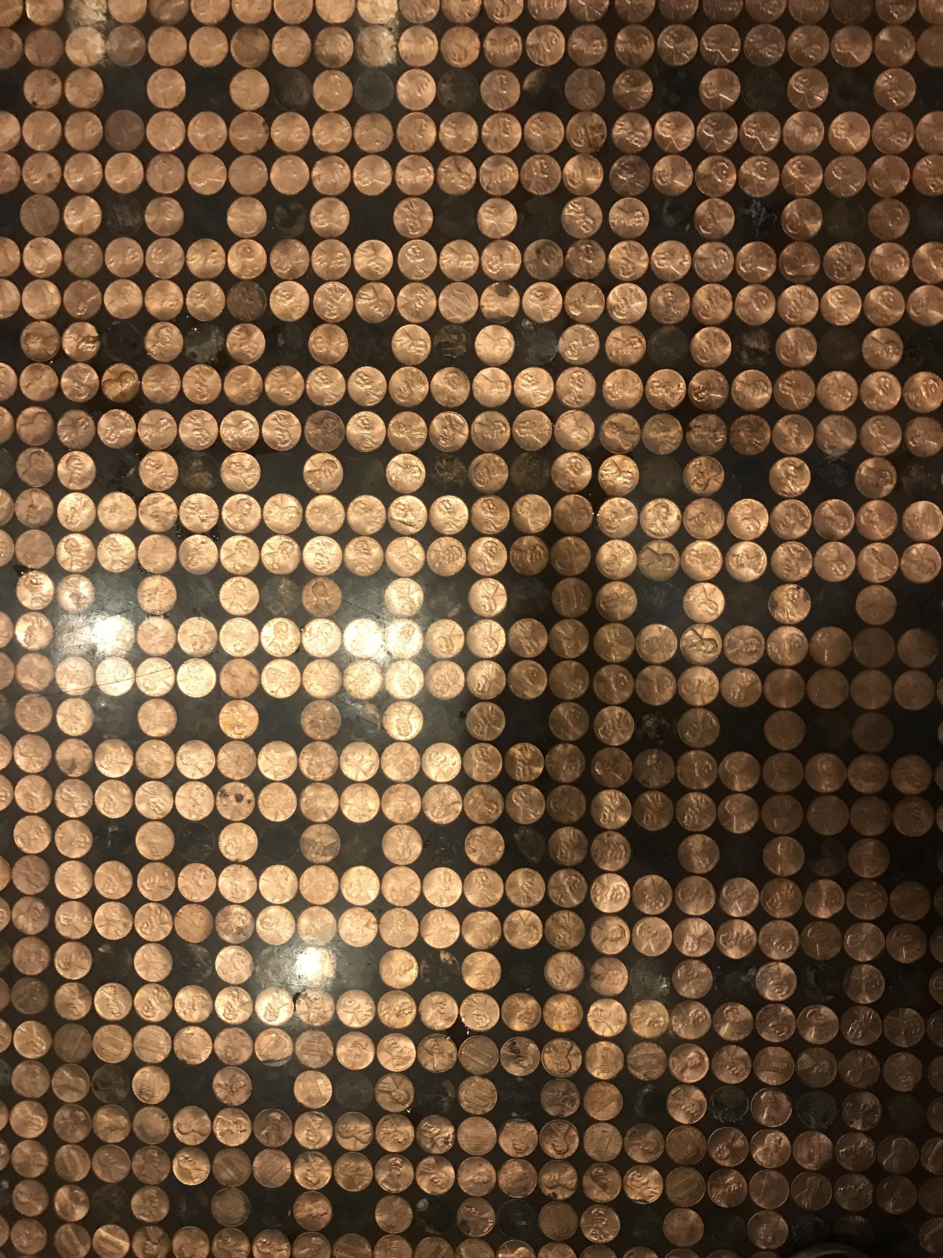 The floor of this bathroom is made out of pennies r/mildlyinteresting