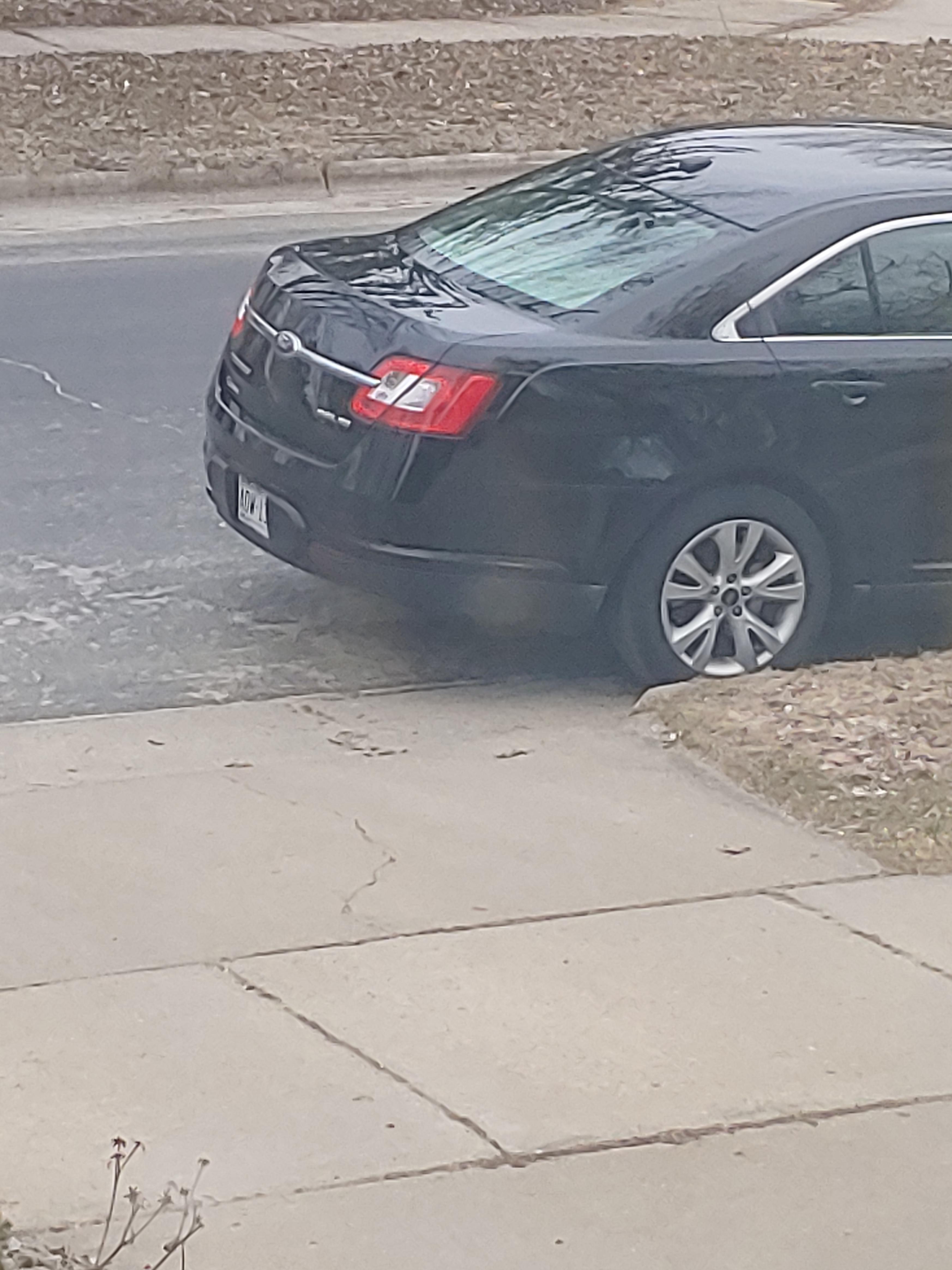 Unknown vehicle parked into my one lane driveway. I need to go to work