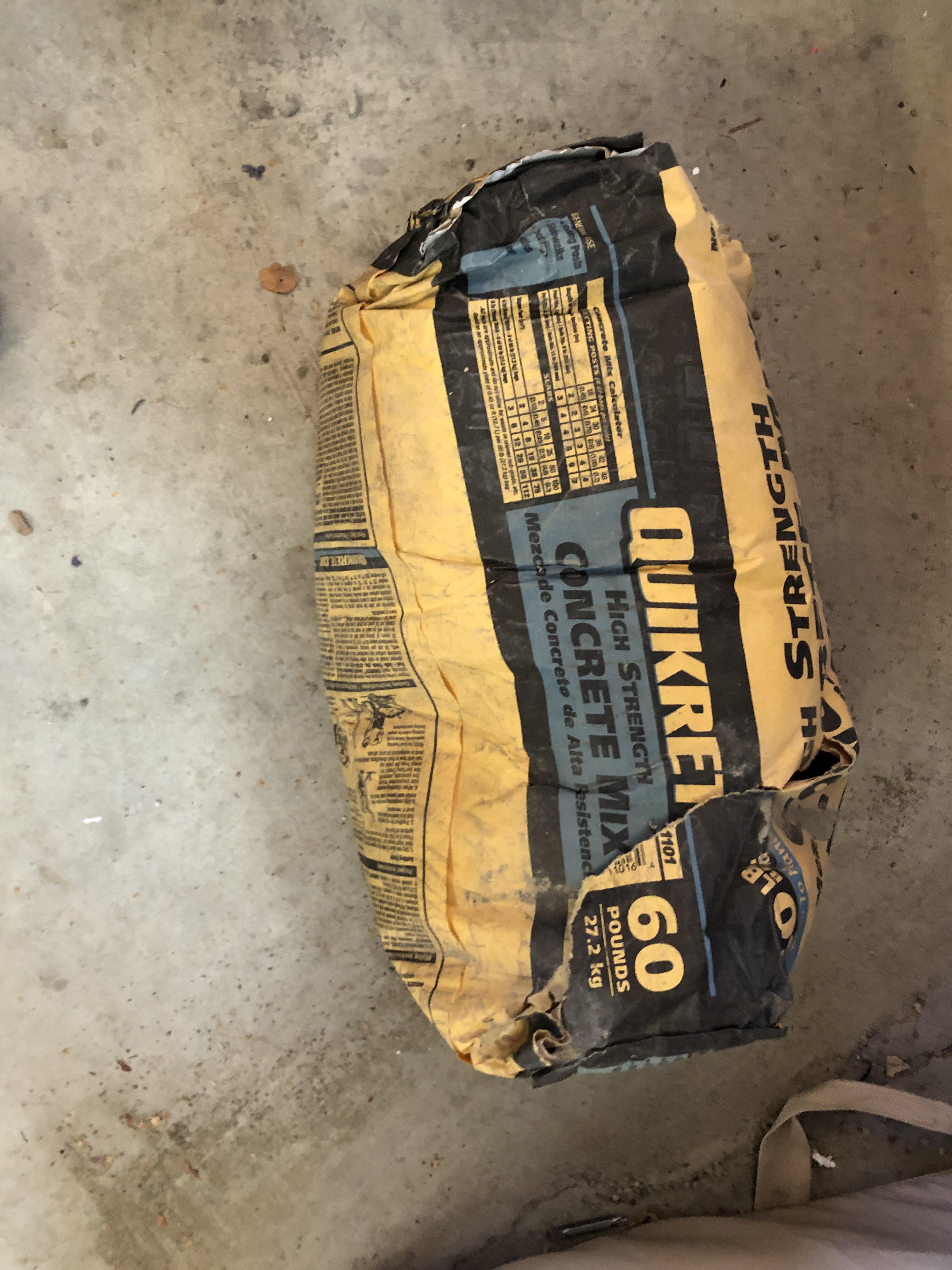 Got an incredible amount of rain and wind. This 60 lb bag of concrete
