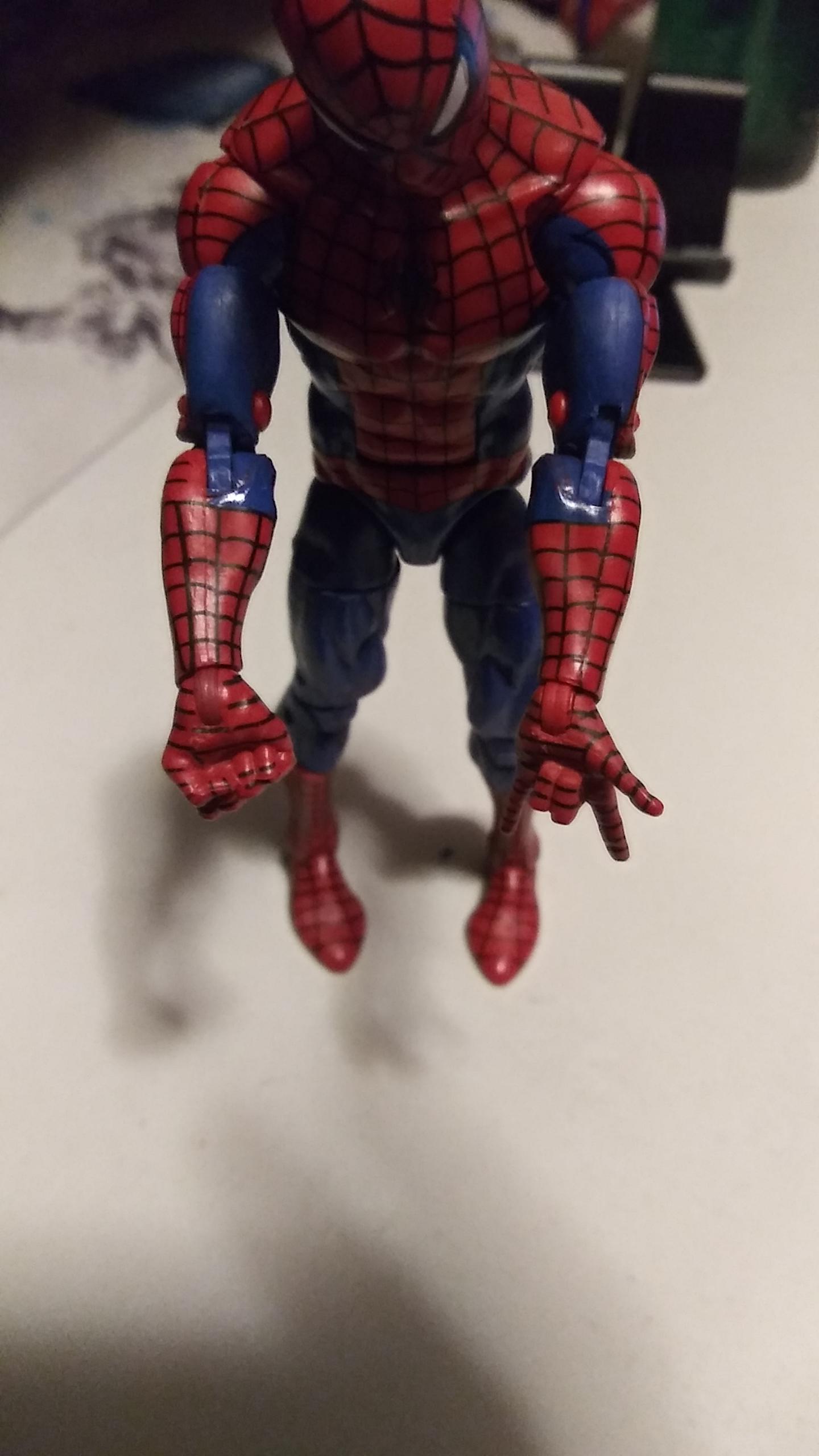 I modified my retro Spidey. His double jointed elbows went only 90 so