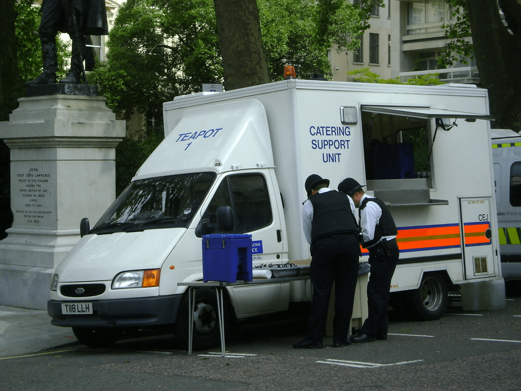 The Met Police Teapot 1 in all it's glory, with two eager officers