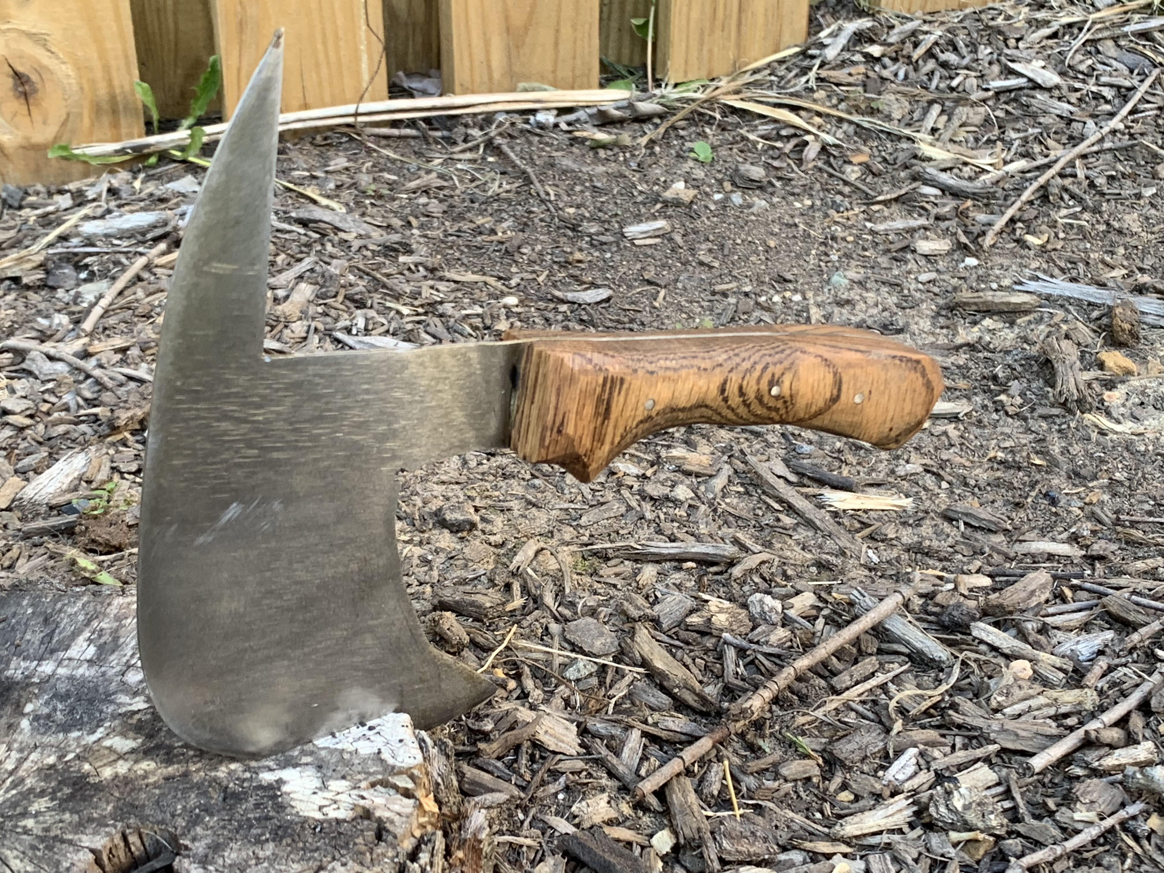 14 y/o amateur here! Made a little hatchet out of a saw blade. What do