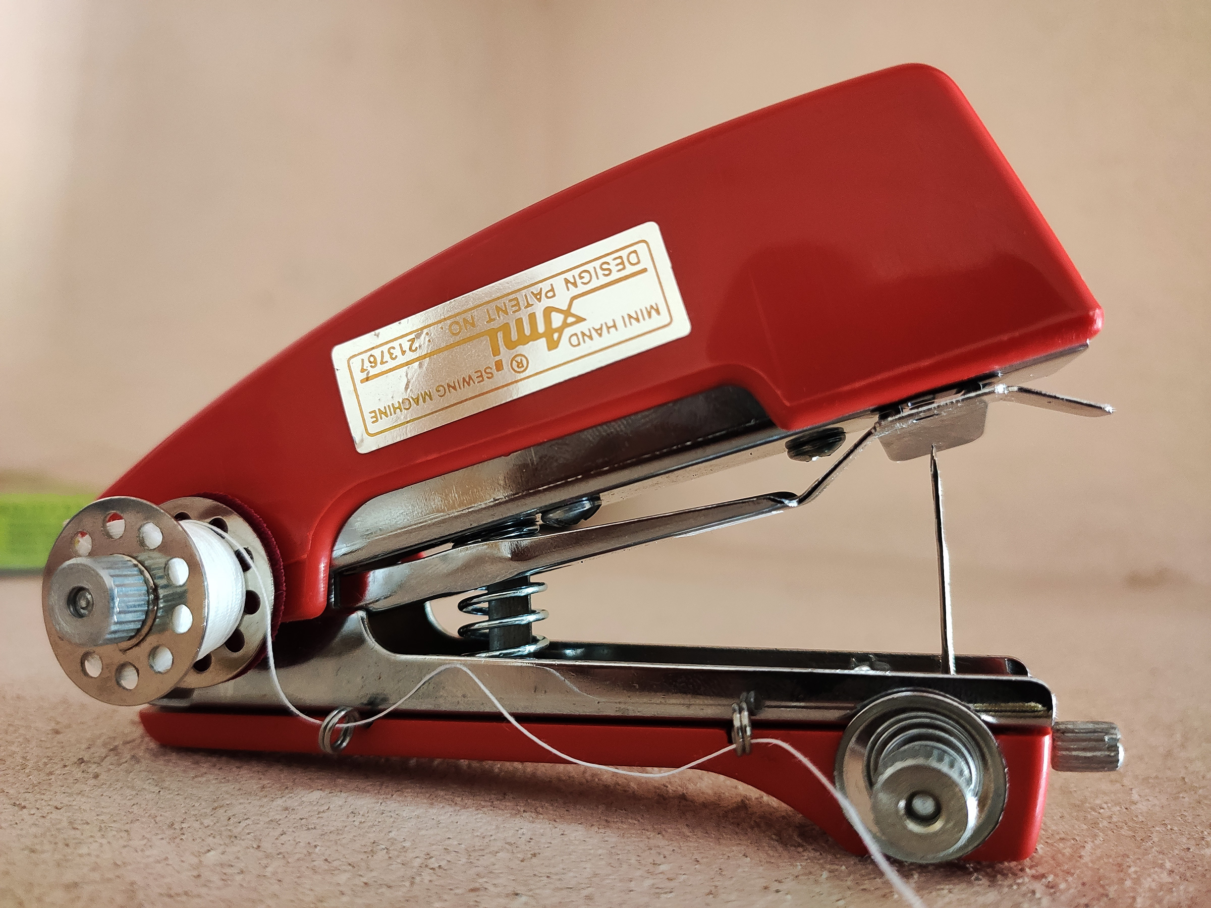 Staplerstyle Mini Hand Sewing Machine. Found it in local Tech Fest