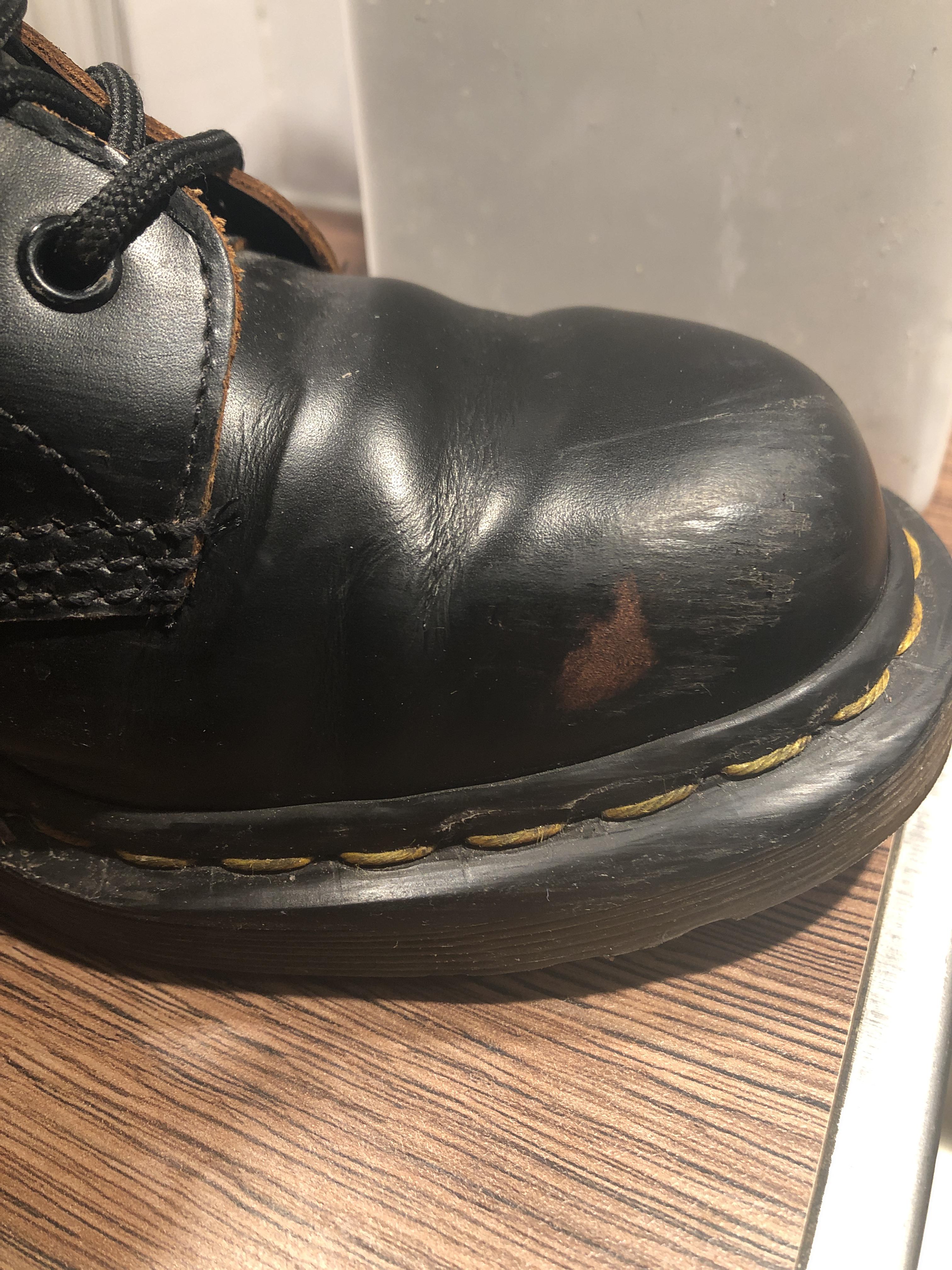 2 months old MIE Dr Martens already have a worn out brown spot. How can