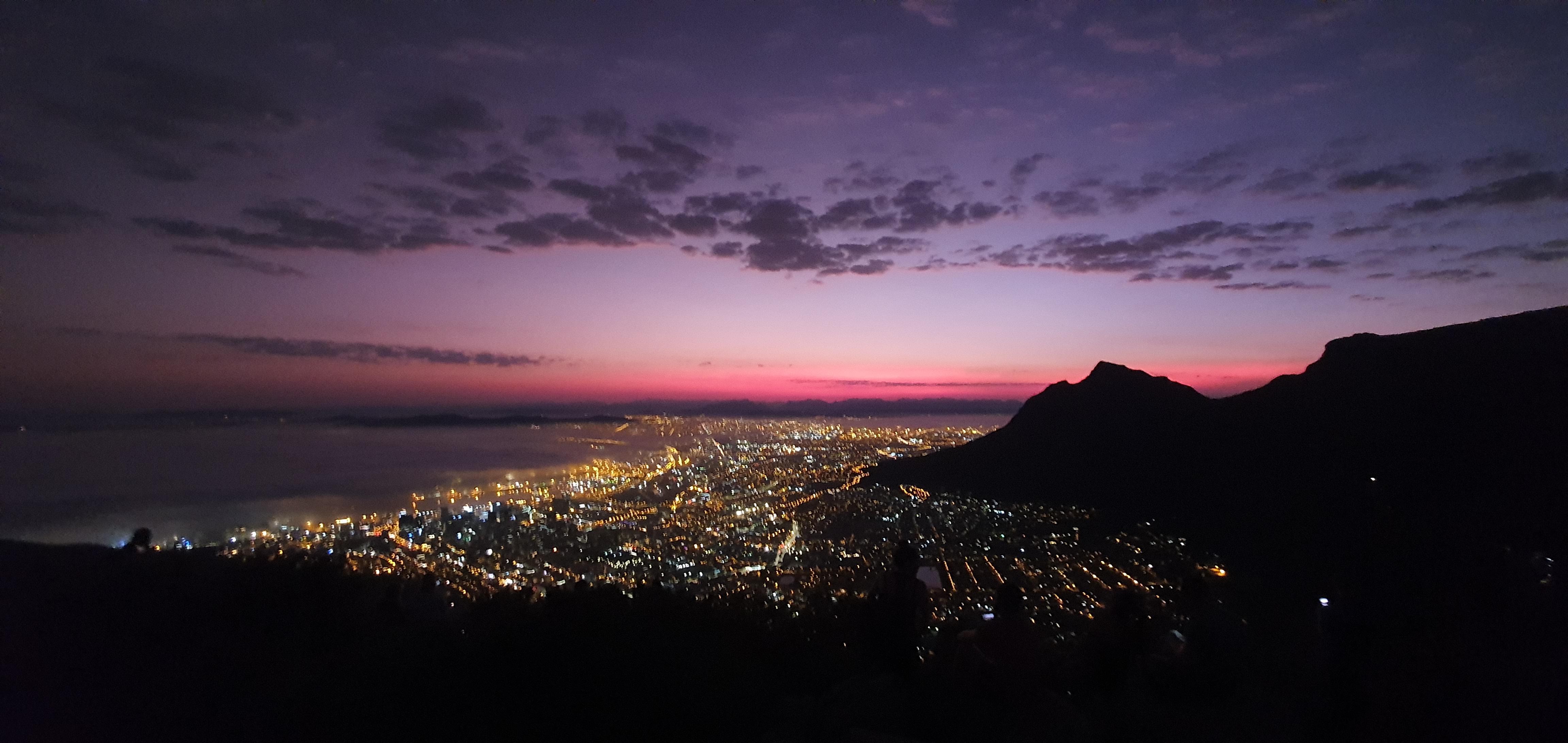 Lion's Head at sunrise with the lights of Cape Town, South Africa r/pics
