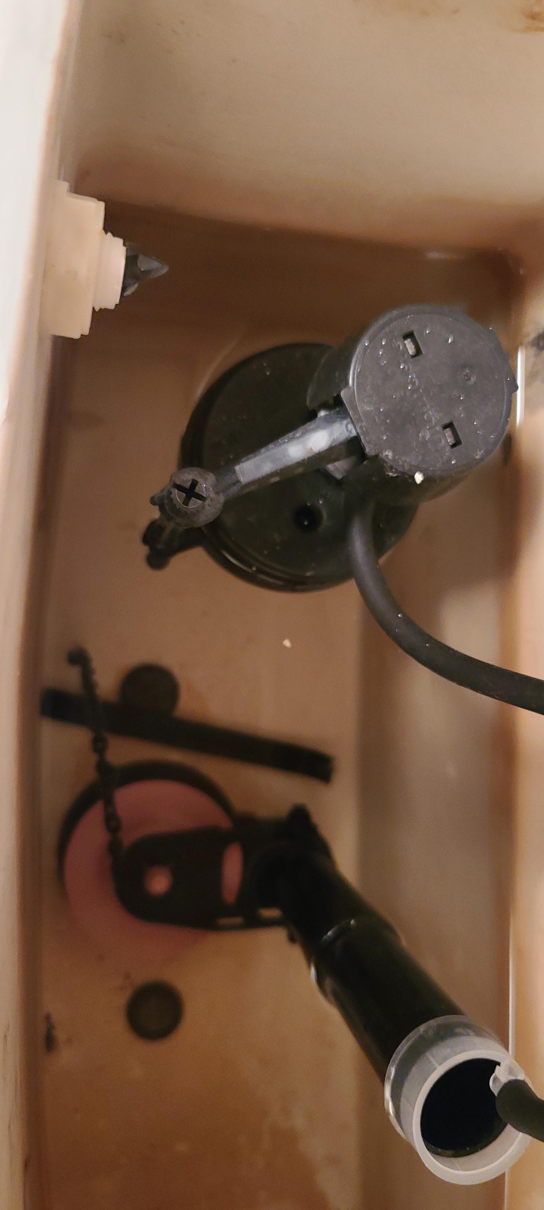 Toilet handle snapped off on the inside??? How do I go about repairing this? Picture isn't great