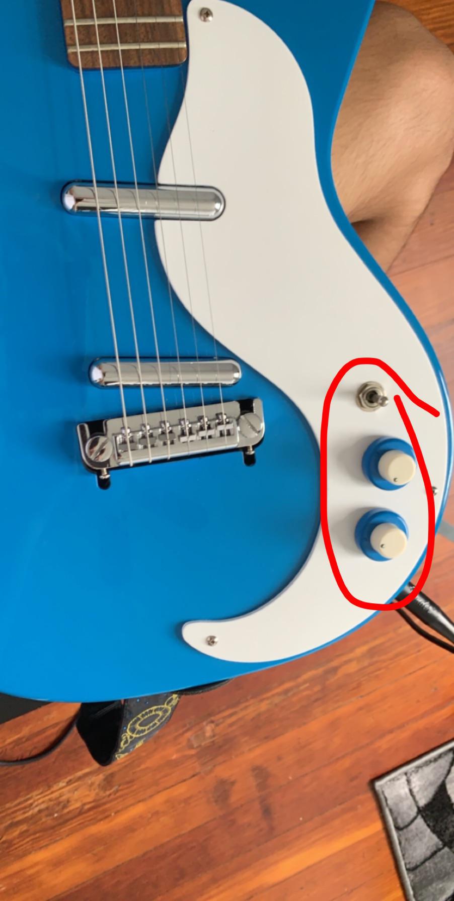 what do the two knobs and switch do? r/guitars