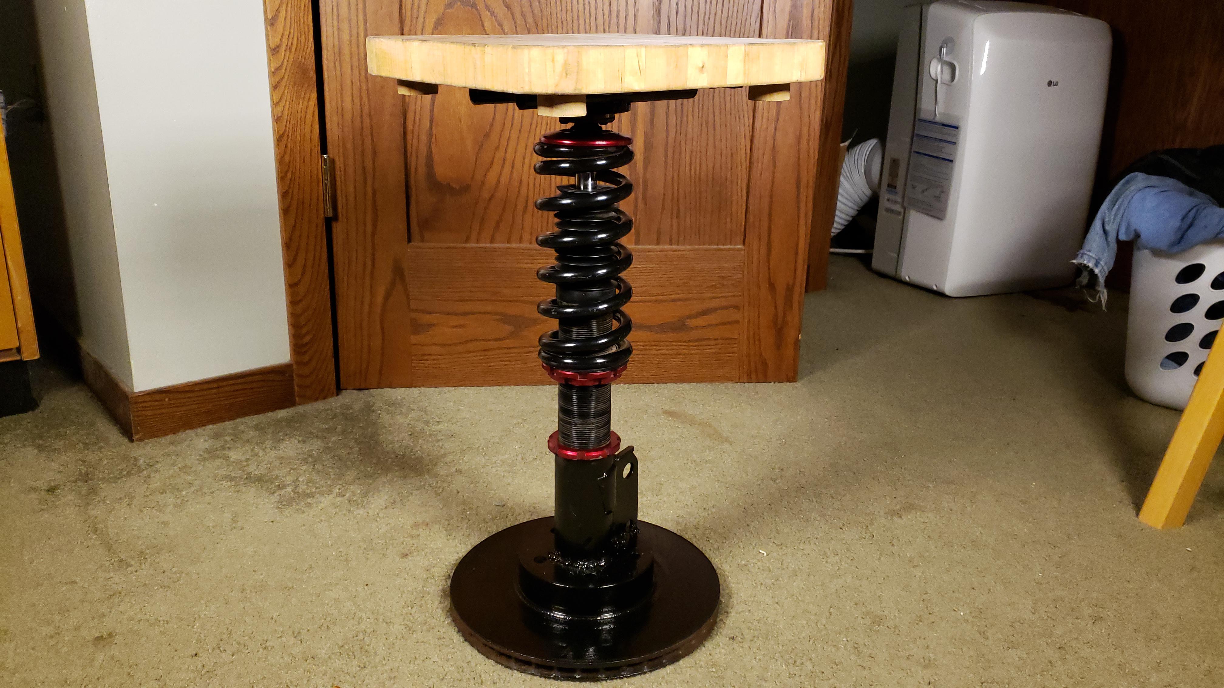 Garage stool I made from recycled car parts r/pics