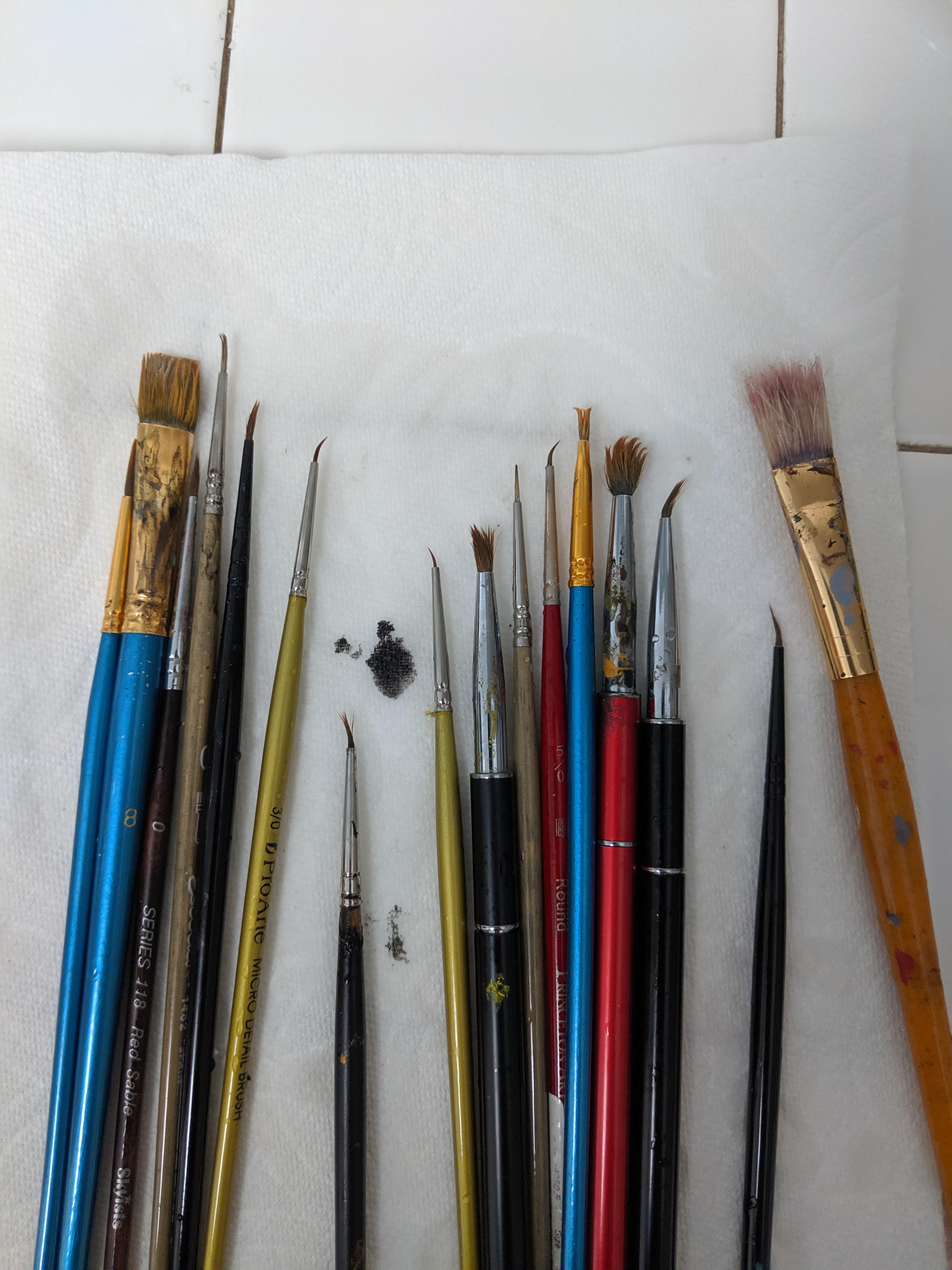 Used a hardcore brush cleaner to clean out some caked on paint. Had to