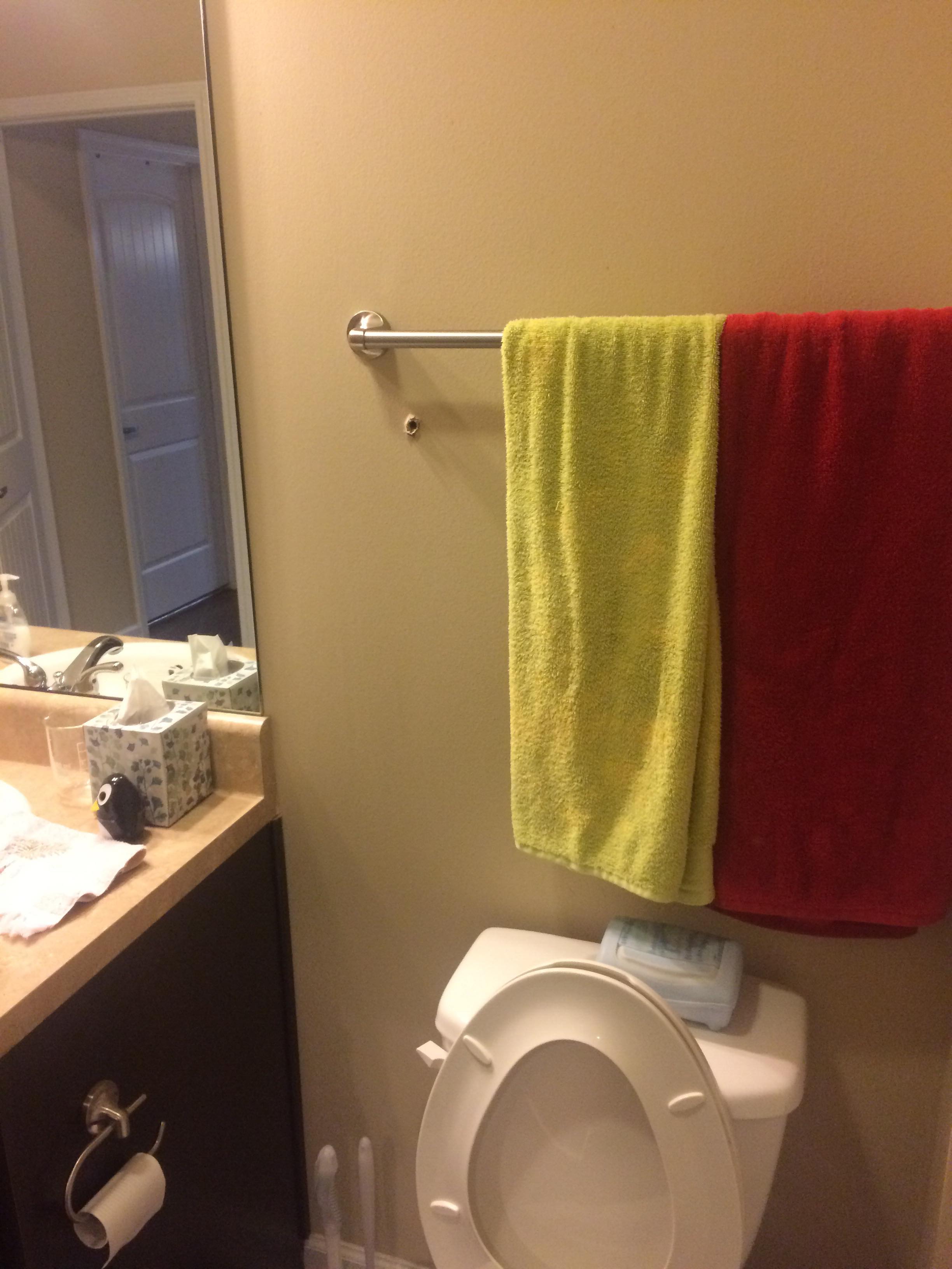 Ahole neighbor fired through bathroom wall, which misfired while