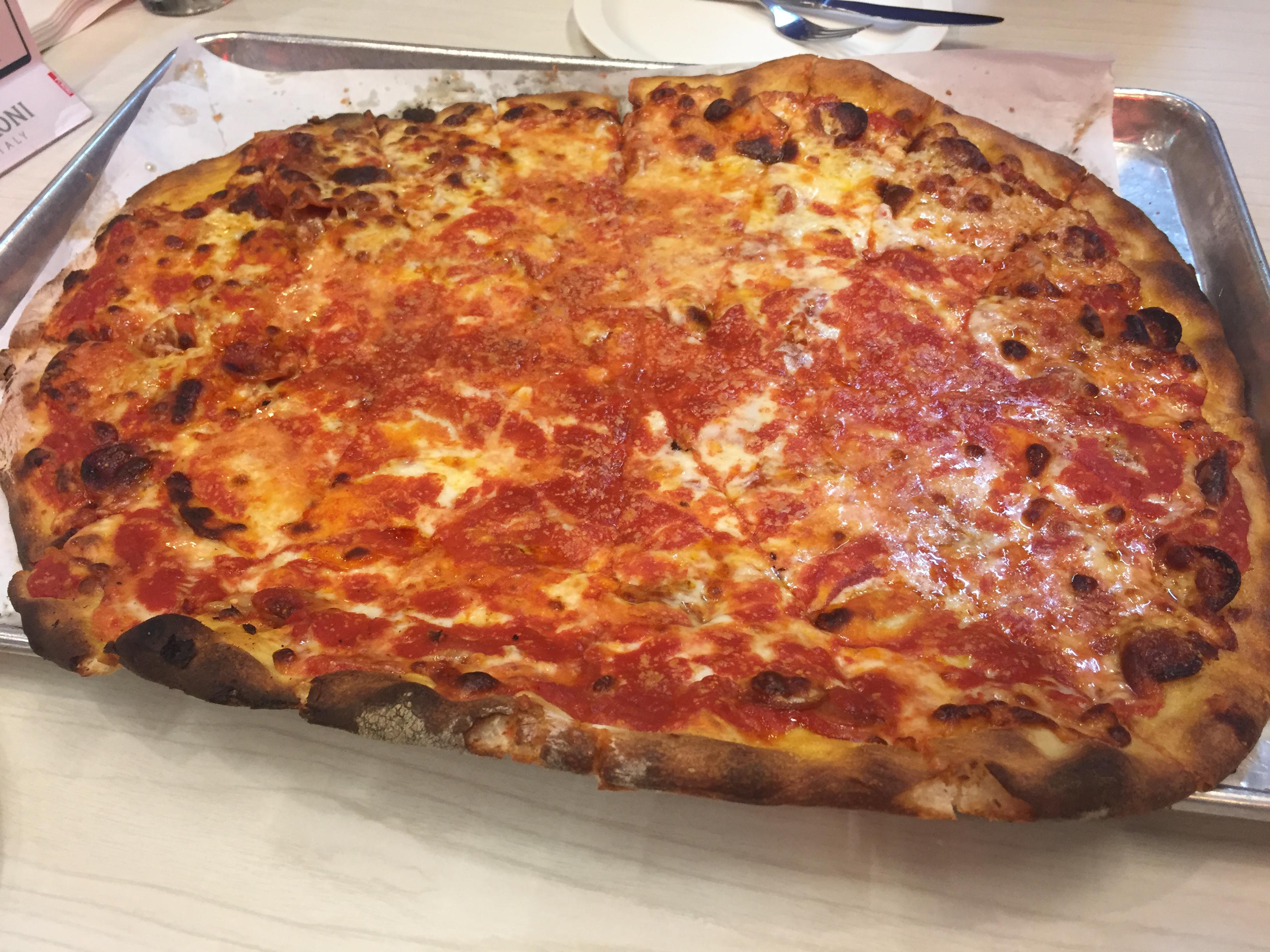 Frank Pepe's Pizza extra sauce, extra mozzarella with pepperoni. r