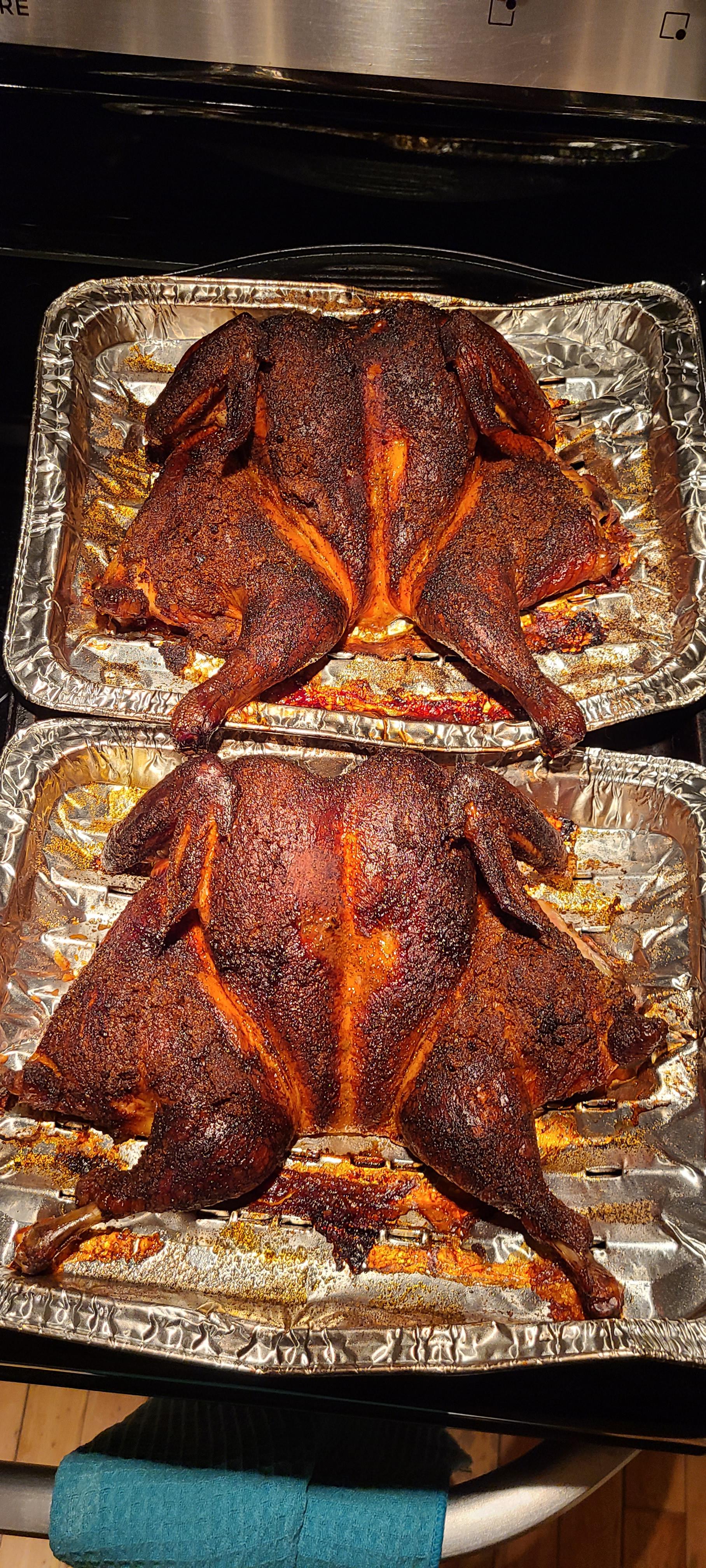 Applewood smoked butterfly chickens rubbed with a simple seasoned salt