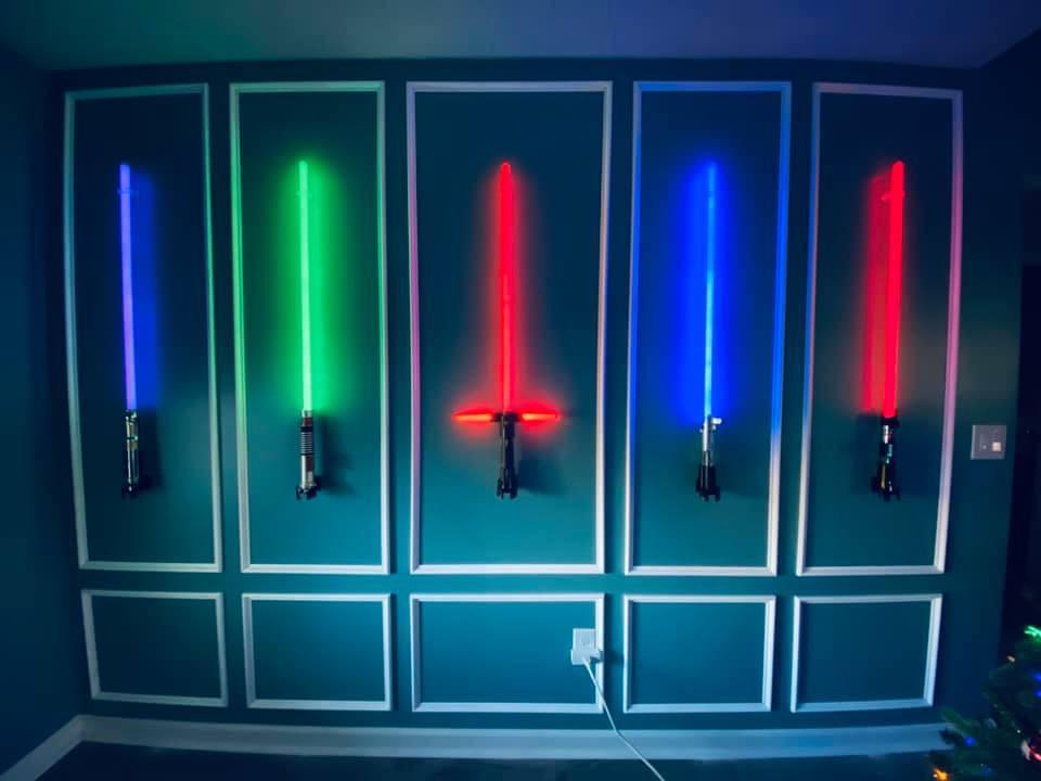 Lightsaber wall built by my wife r/StarWars