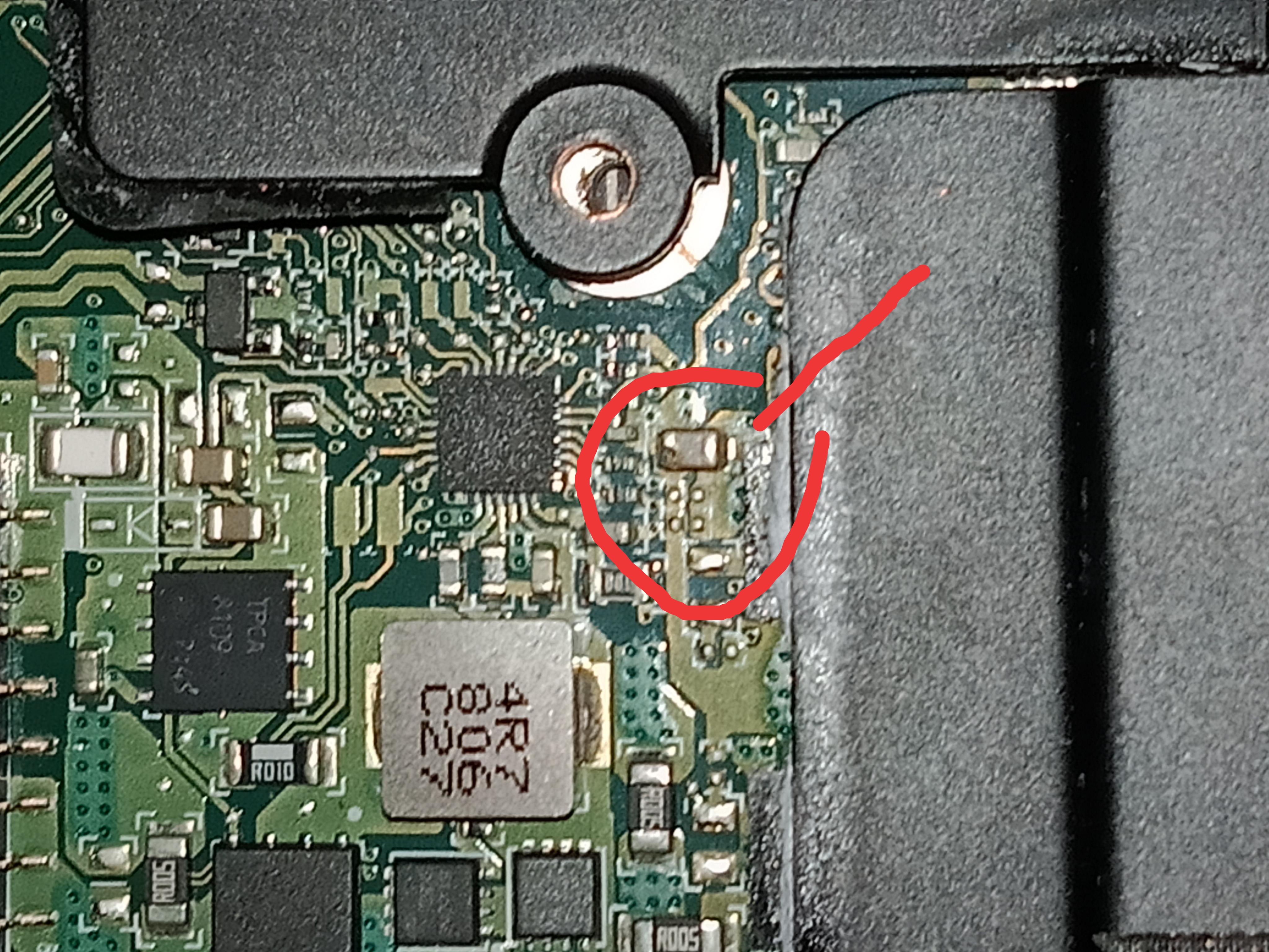 Dropped a screw on my laptop's motherboard, sparks everywhere, now this